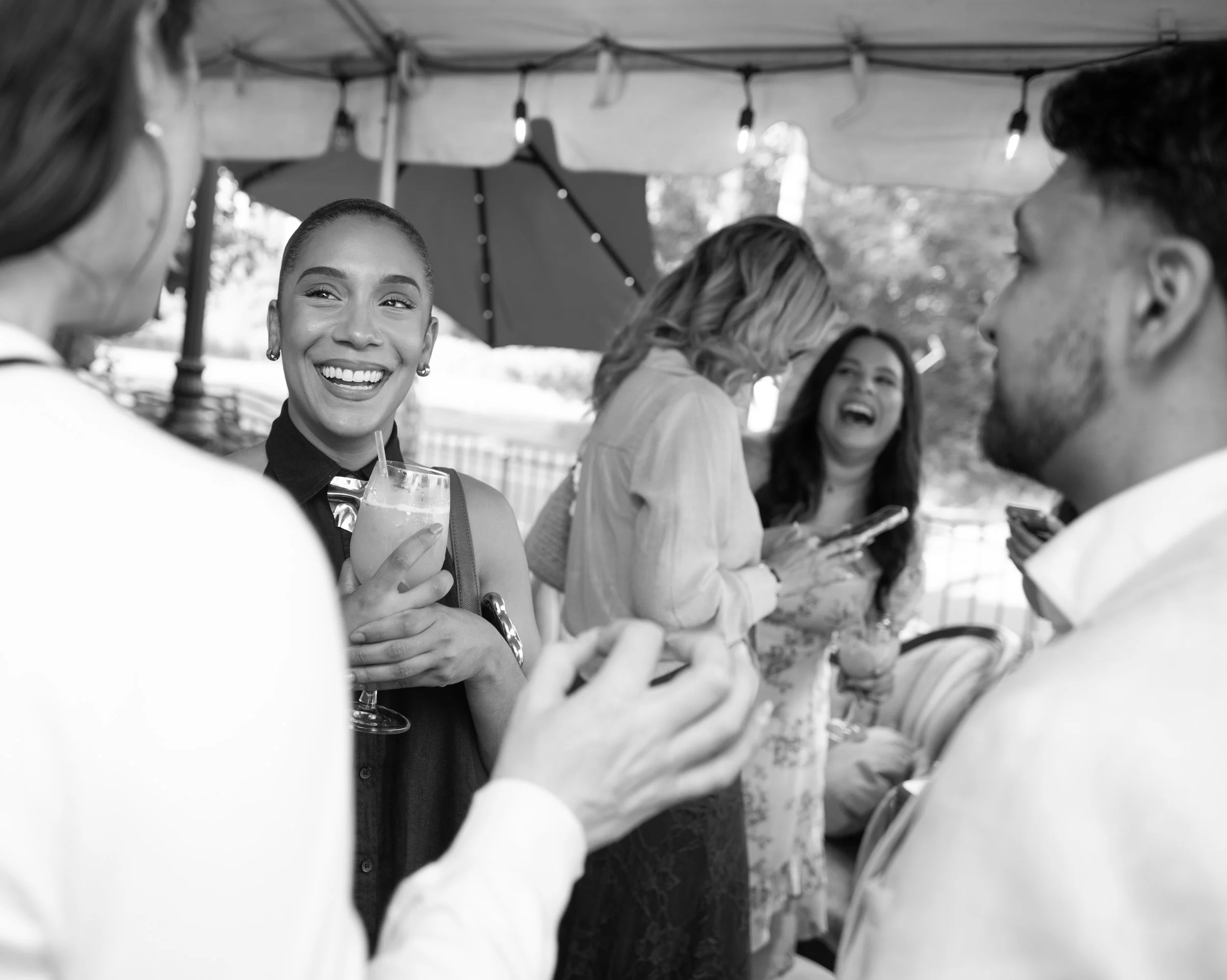 Wedding professionals building meaningful connections at The Wedding Planners Collective's Golden Hour Social networking event in Wallkill, New York.