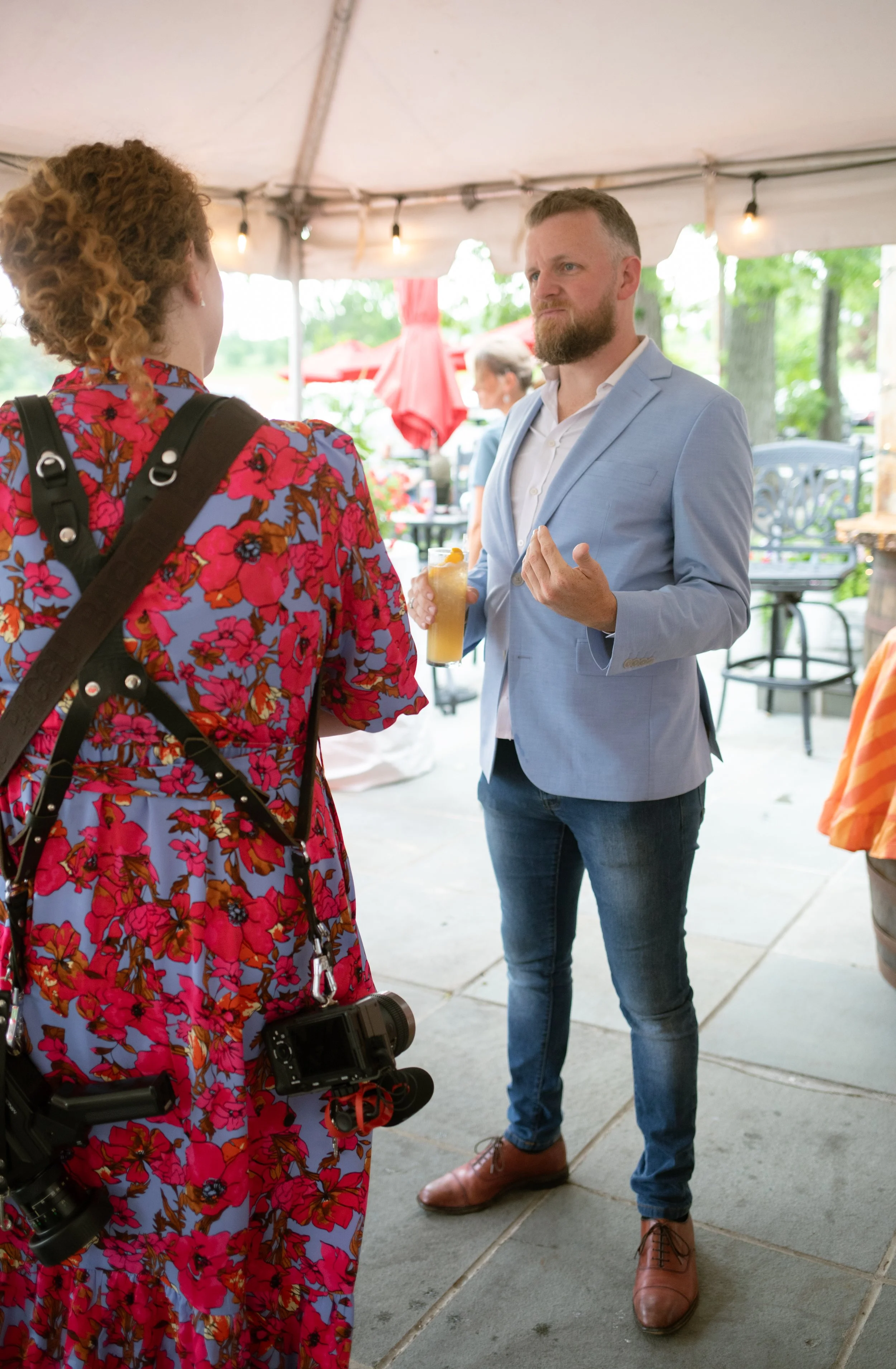 Wedding professionals connecting and conversing during The Wedding Planners Collective's Golden Hour Social networking event.