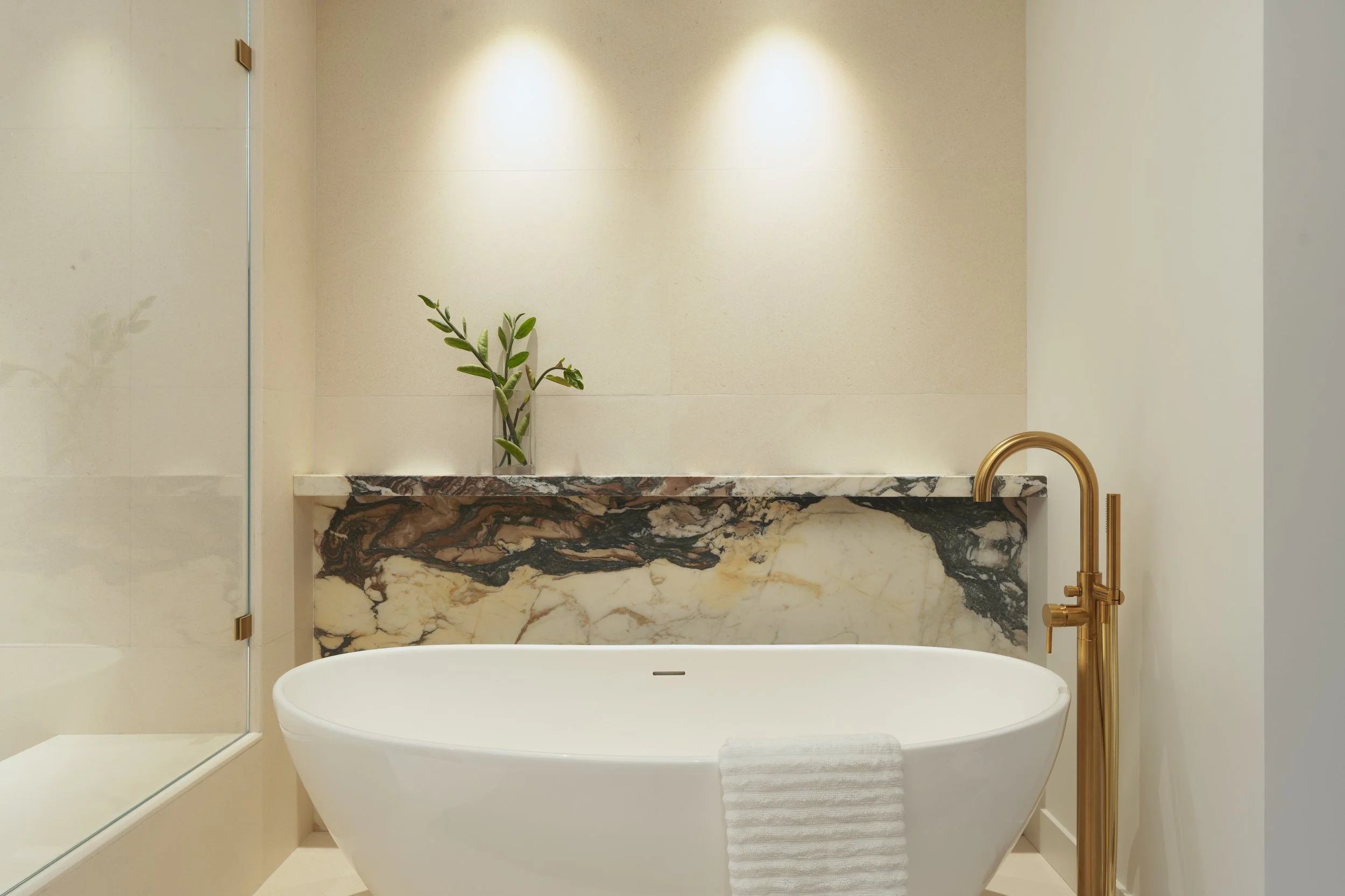 Jonathons Coastal Living interior design custom primary bathroom remodel showcasing luxury serene design with bathtub in Dana Point, Orange County, CA