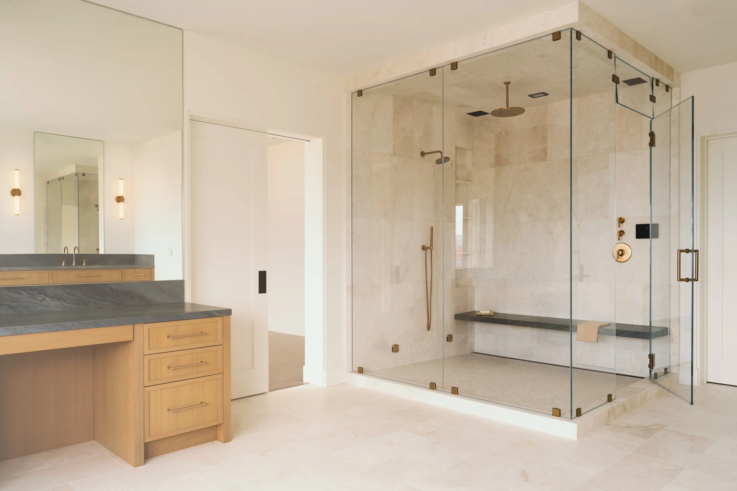 Jonathons Coastal Living interior design custom primary/master bathroom remodel in a simplistic traditional style showcasing a large walk-in shower in Dana Point, Orange County, CA