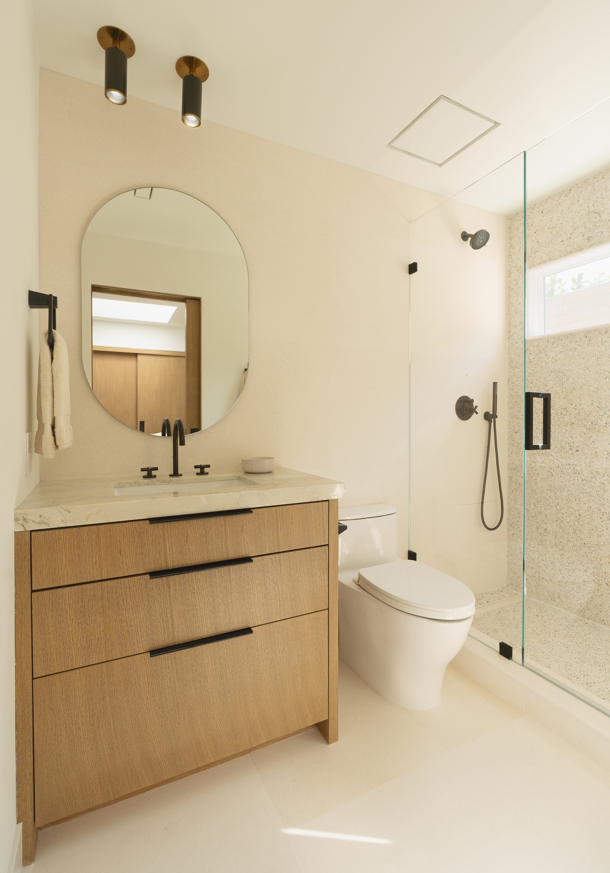 Jonathons Coastal Living interior design guest bathroom remodel showcasing serene, spa-like design in Dana Point, Orange County, CA