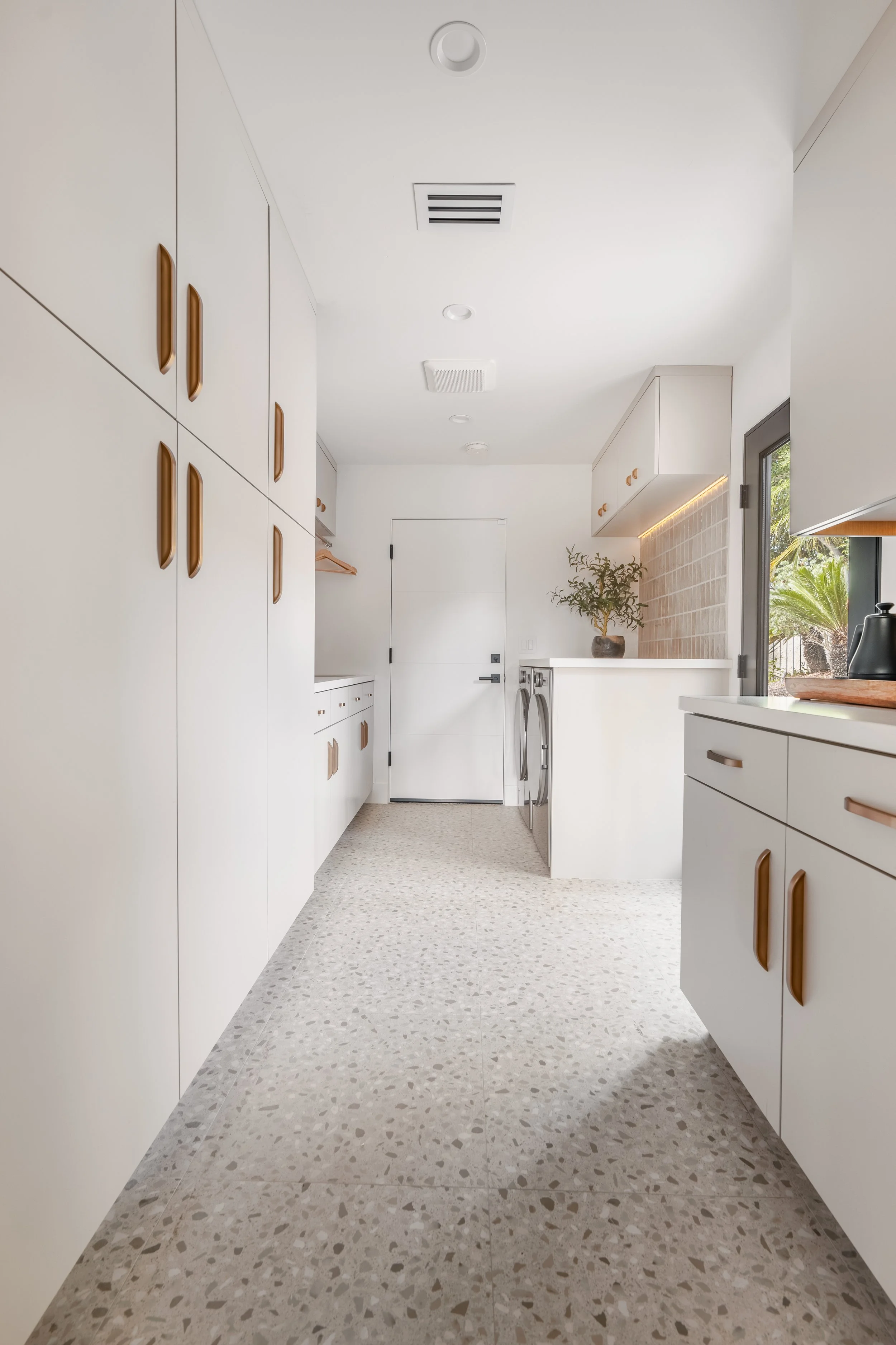 Jonathons Coastal Living interior design custom laundry room remodel with terrazzo floors in Yorba Linda, Orange County, CA