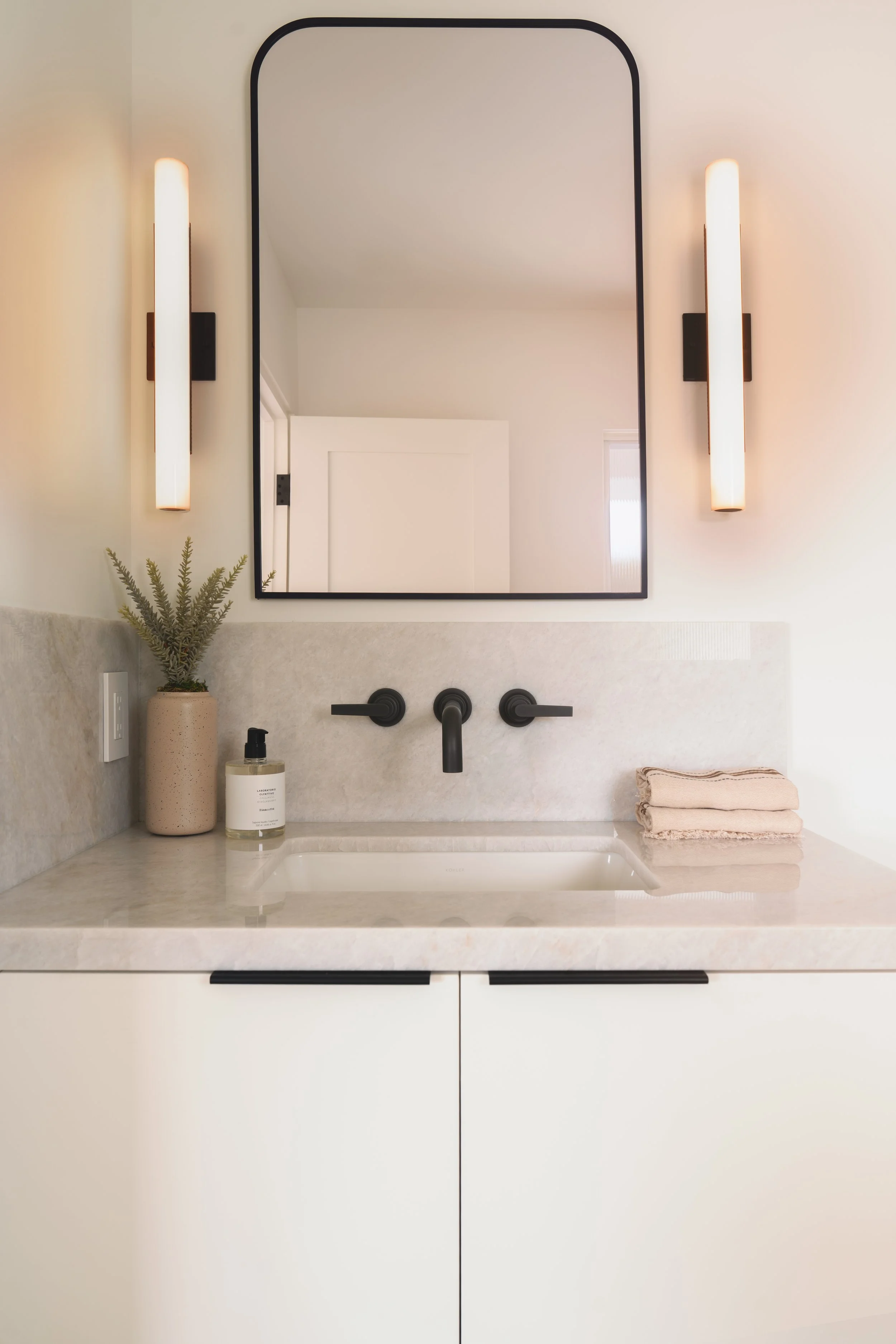 Jonathons Coastal Living interior design custom guest bathroom vanity remodel a simplistic traditional style in Dana Point, Orange County, CA