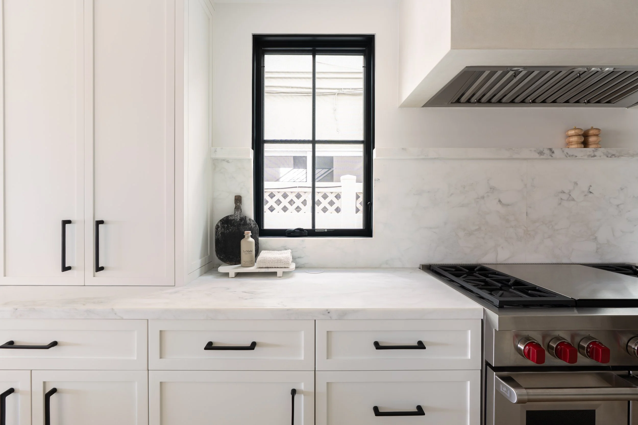 White kitchen remodel with storage in Newport Beach, CA