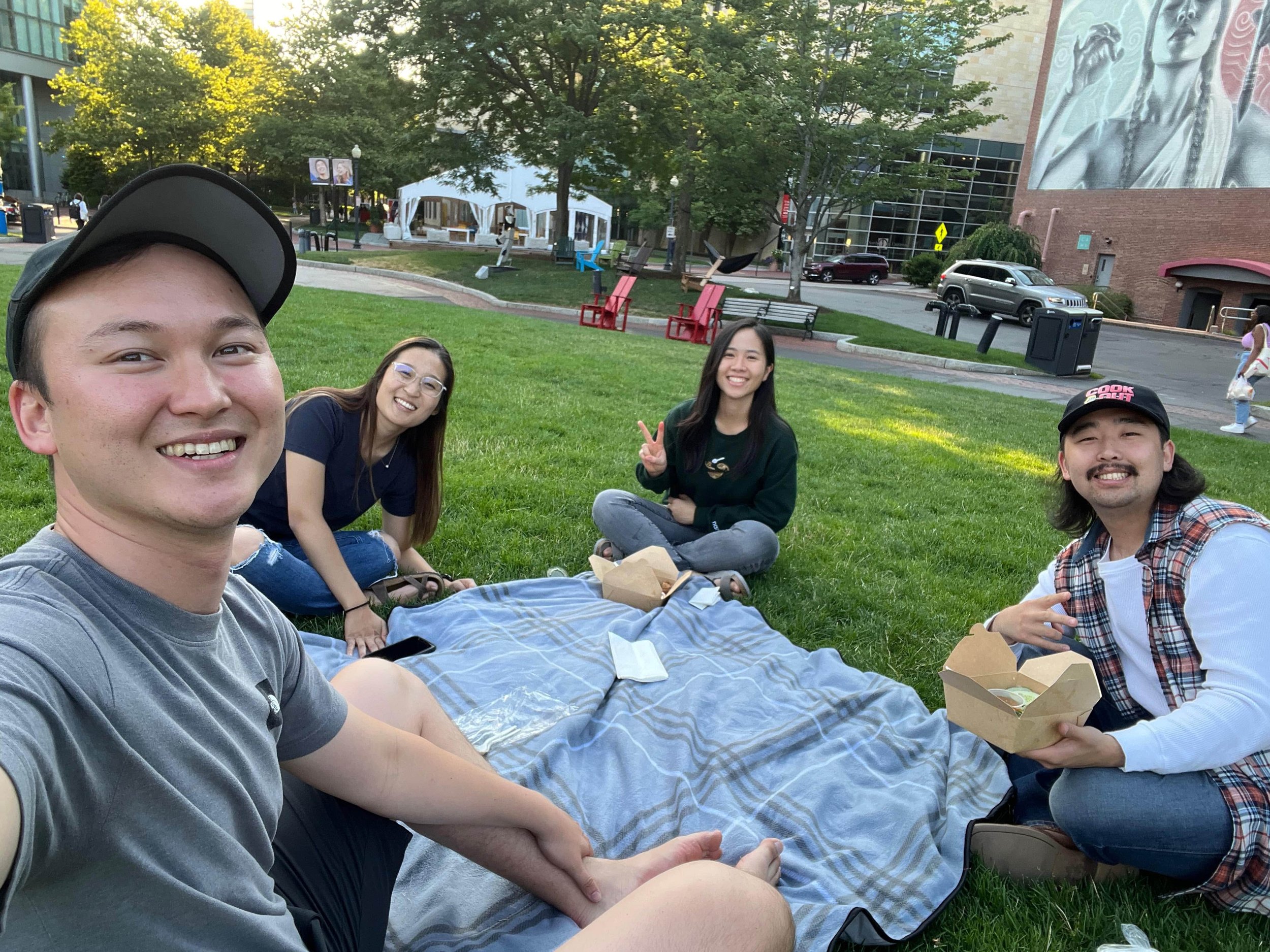 Gracepoint Boston's international team at a picnic near the Charles
