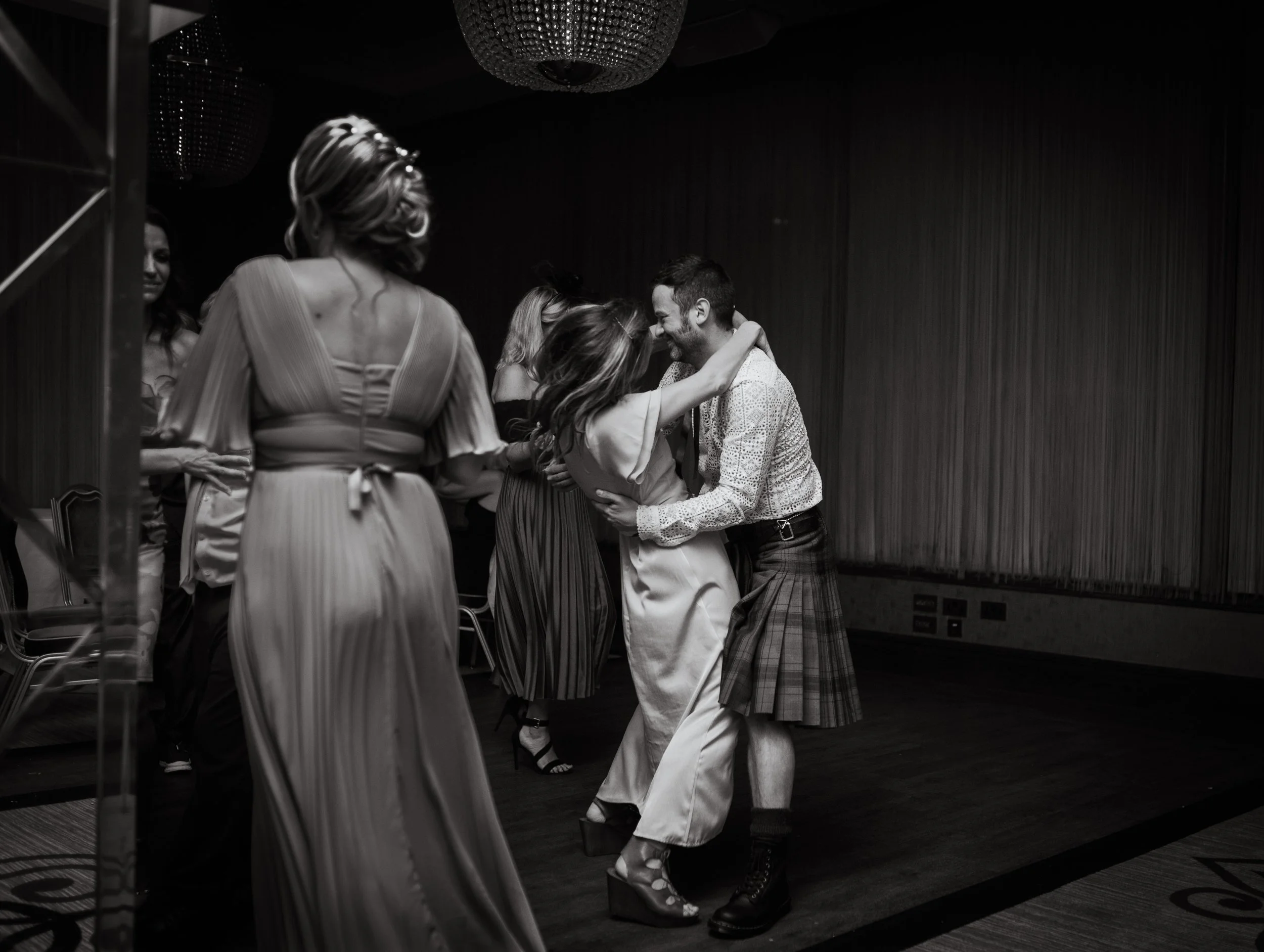 Wedding guests dancing at the wedding reception