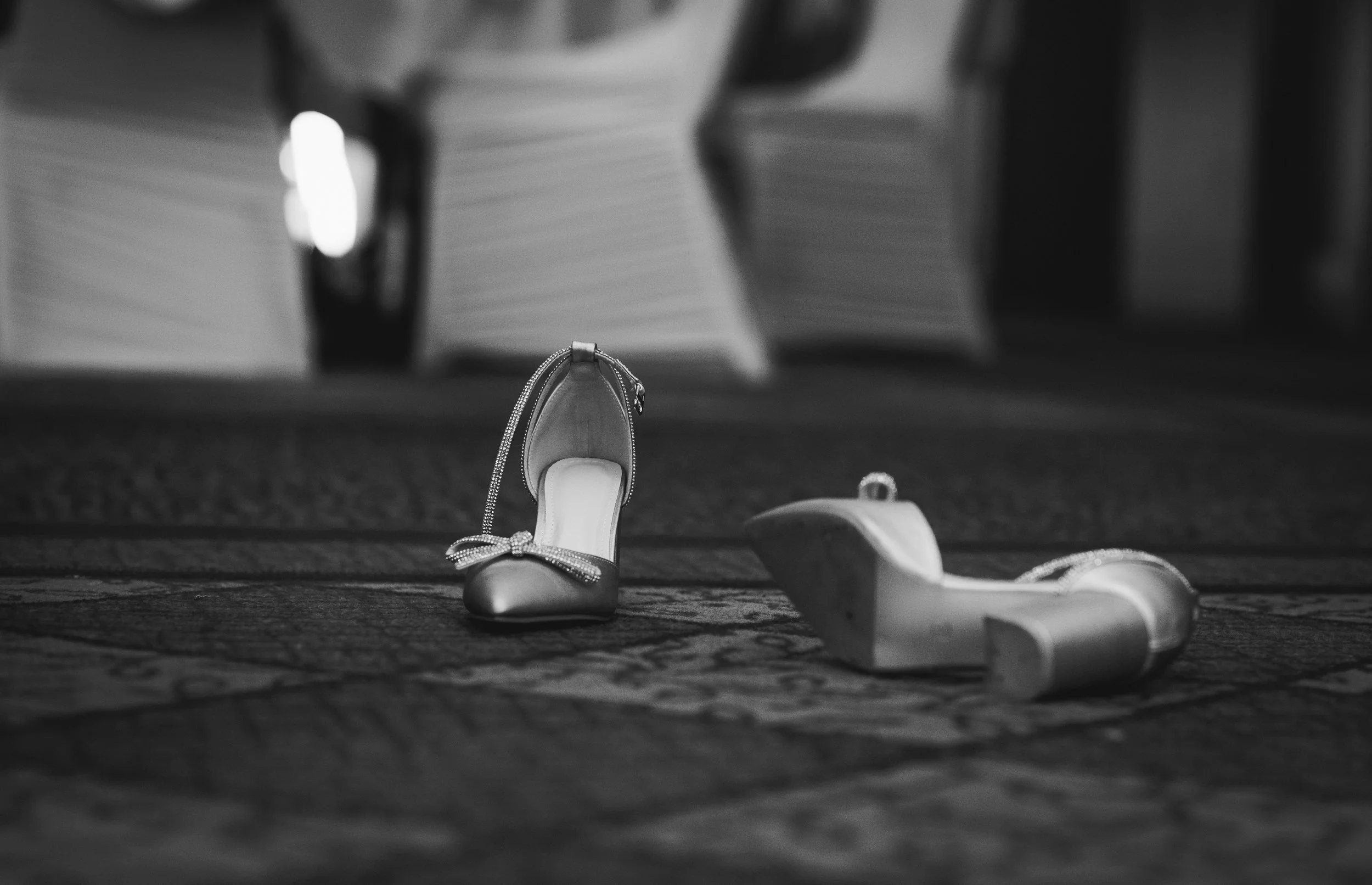 Elegant wedding shoes photographed during the evening reception