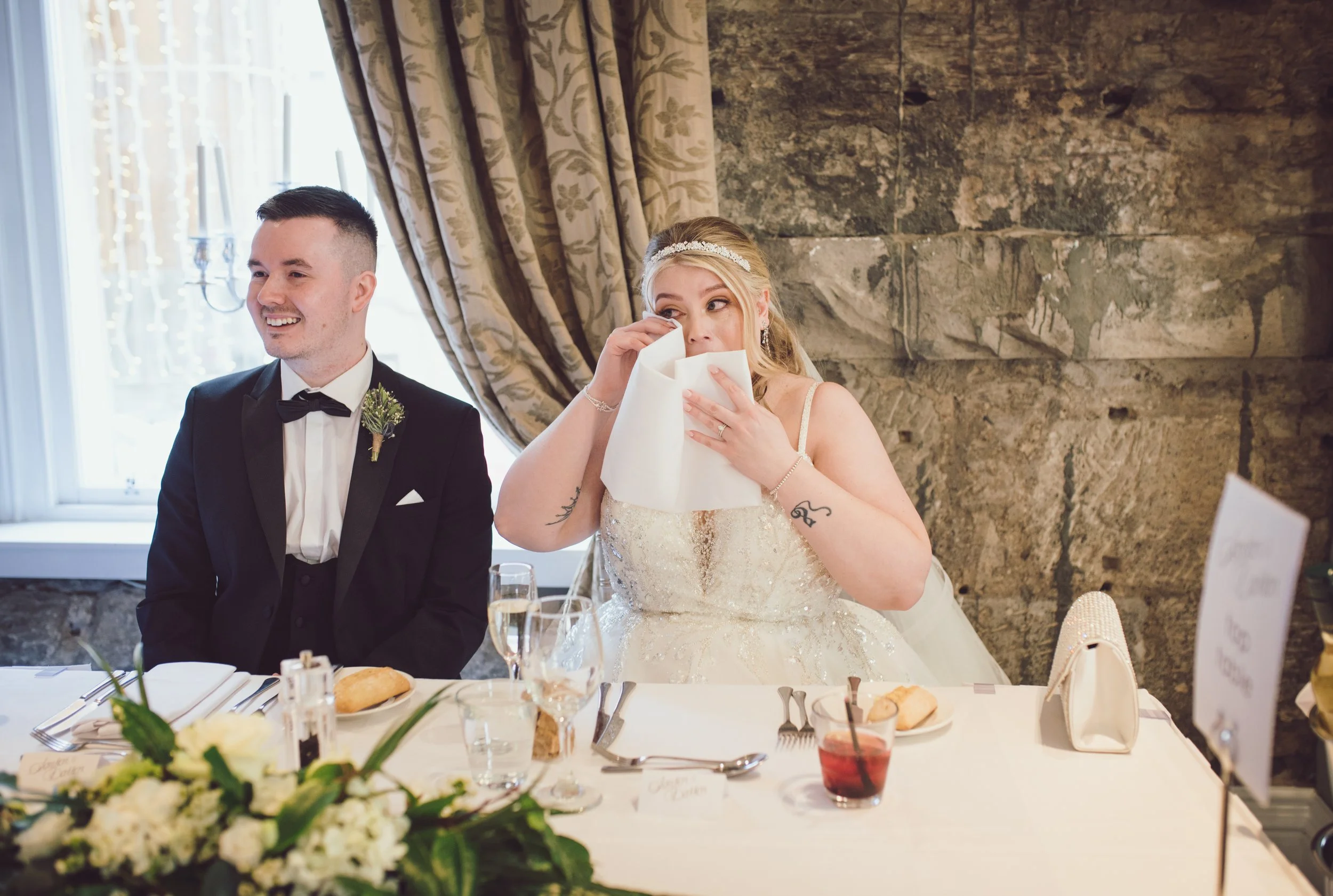 Bride becoming emotional during speeches at her Glasgow wedding reception