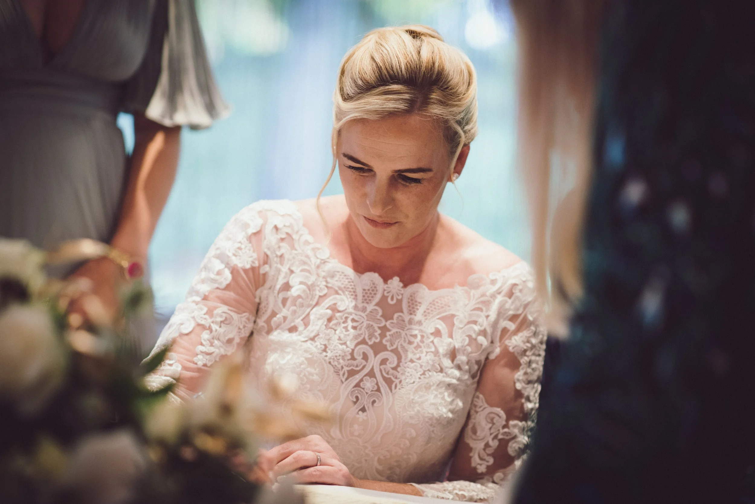 Bride signing the registry