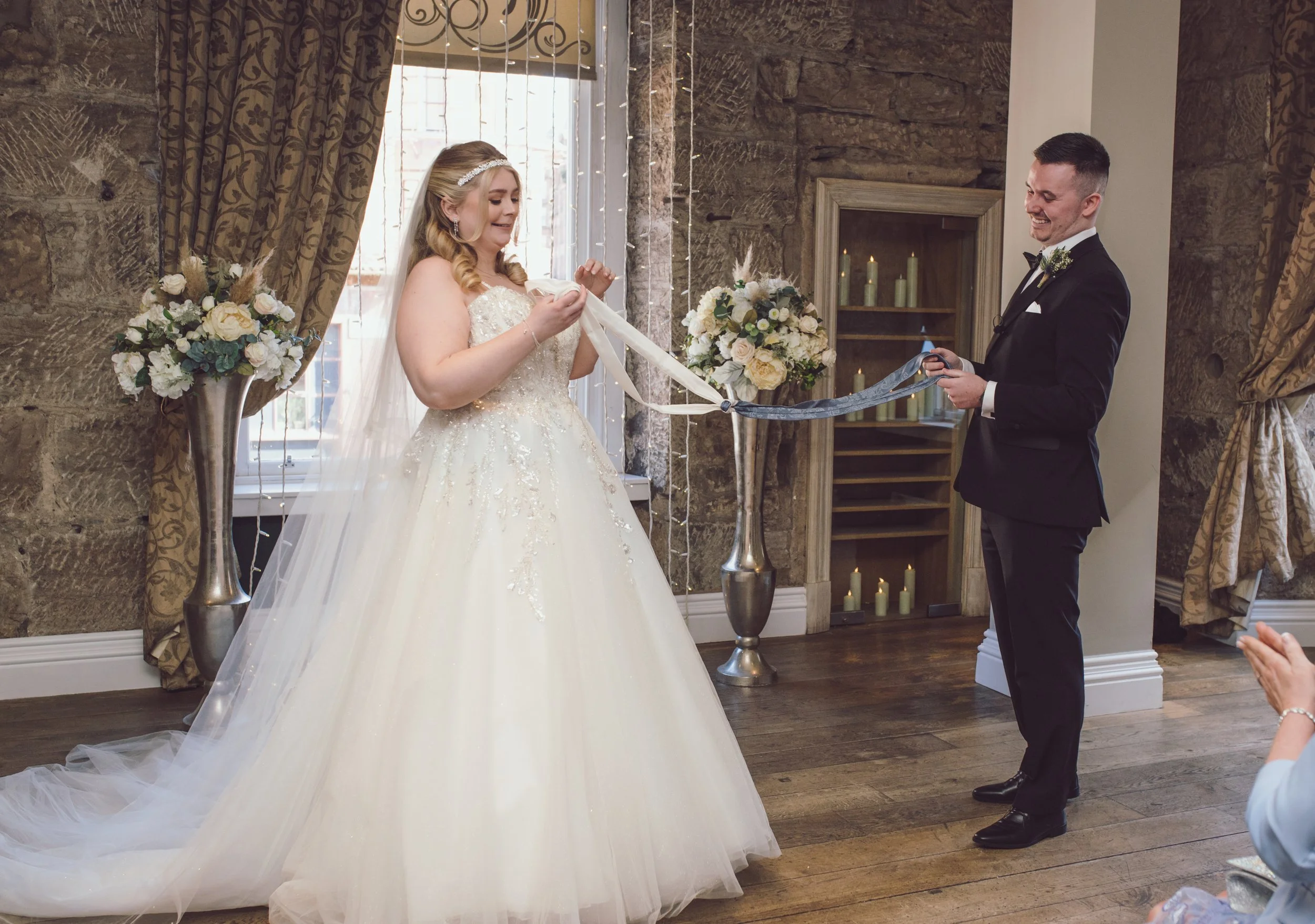 Bride and groom exchanging a personal wedding ceremony moment at Citation Glasgow
