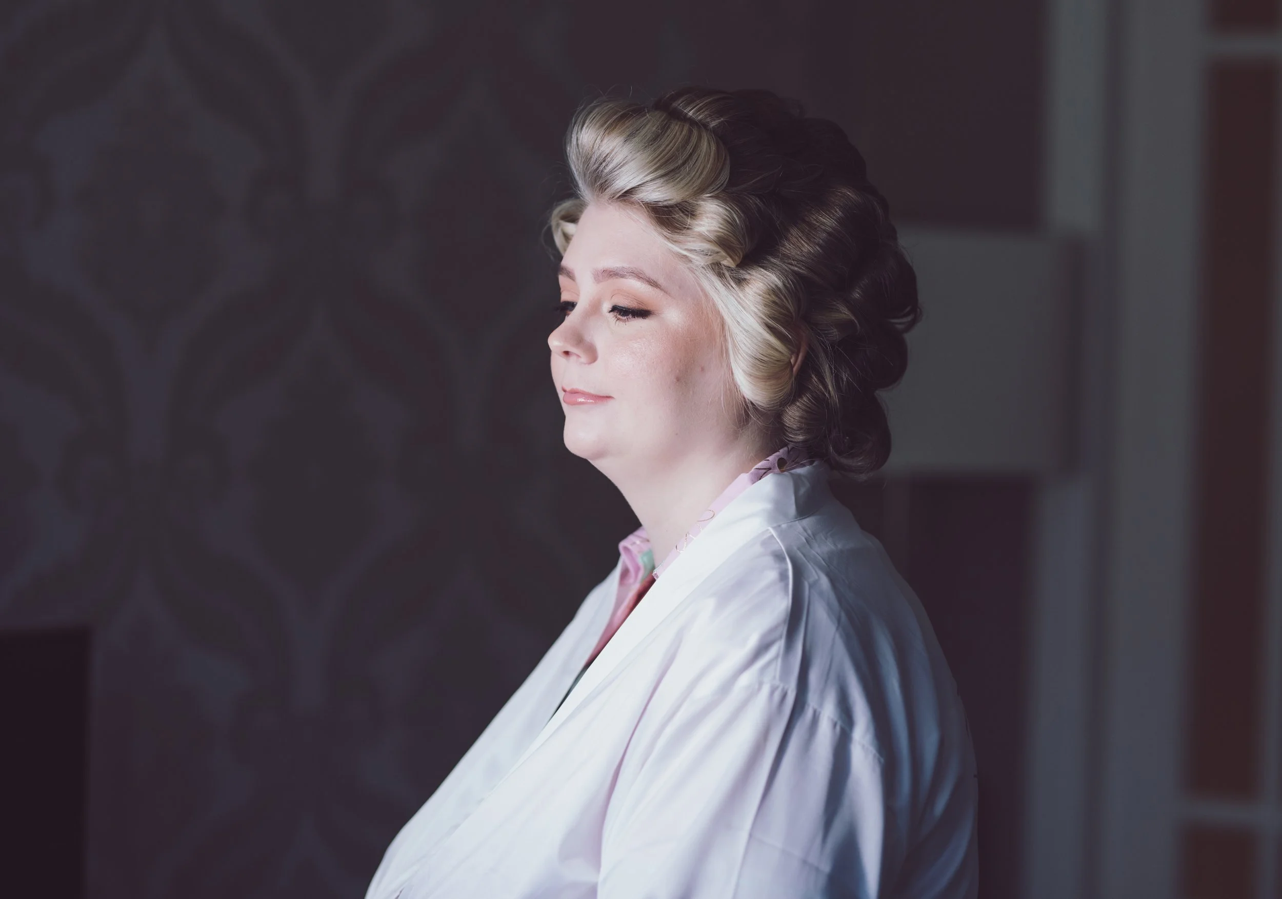 Bride having a quiet moment during her wedding preparations in Glasgow