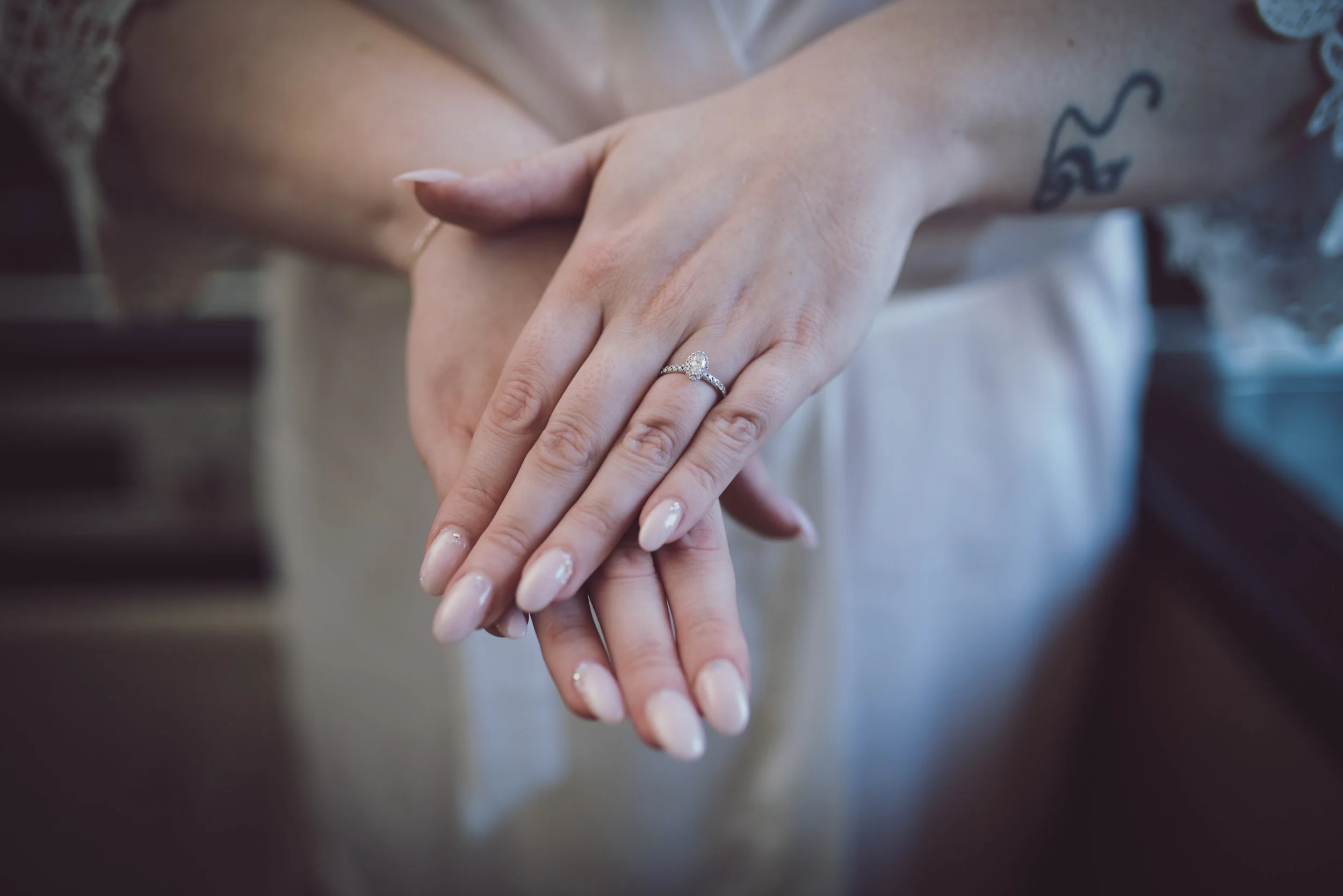 Close-up of bride's wedding ring and manicured hands during her Glasgow wedding