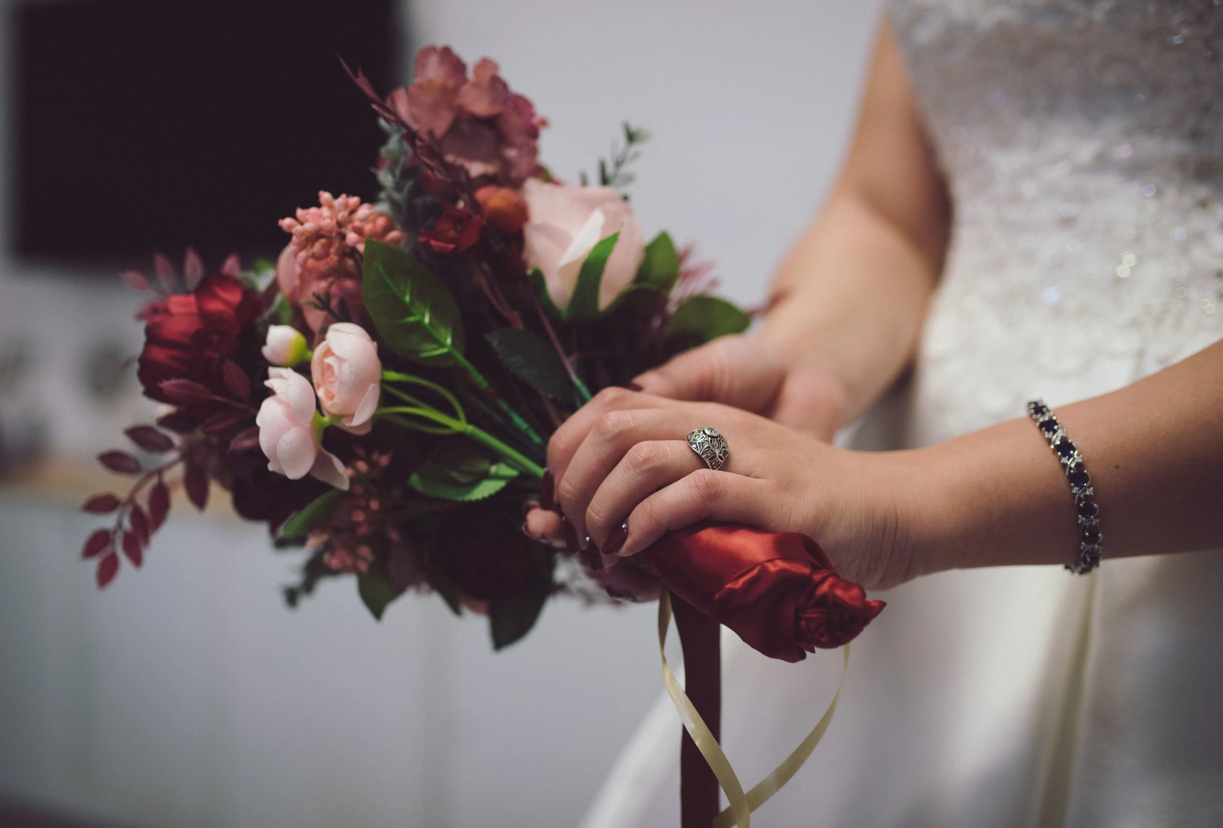 Close-up of a bride holding her wedding bouquet