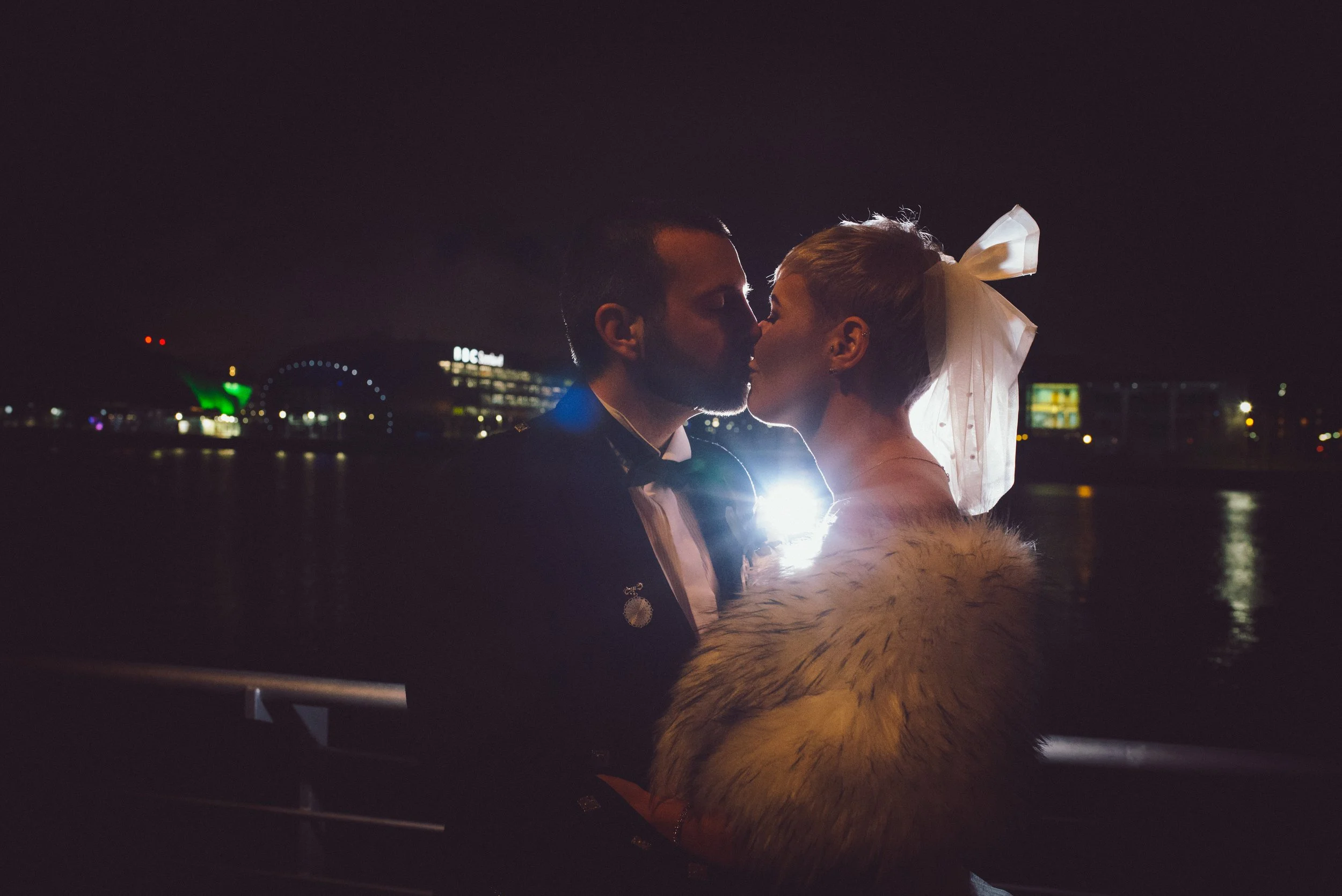 Newlywed couple sharing a kiss