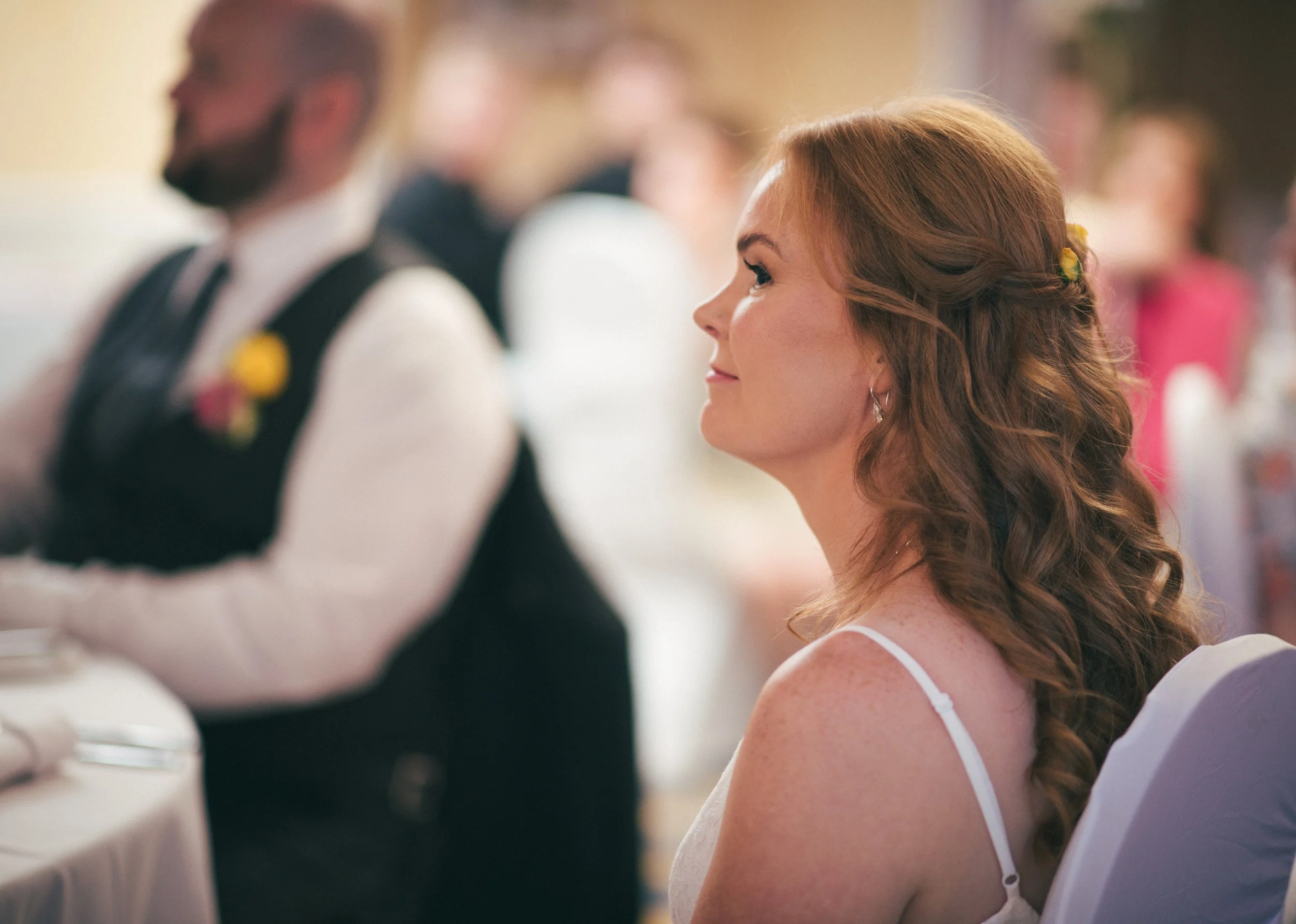 Bride listening during the ceremony before the celebrations begin