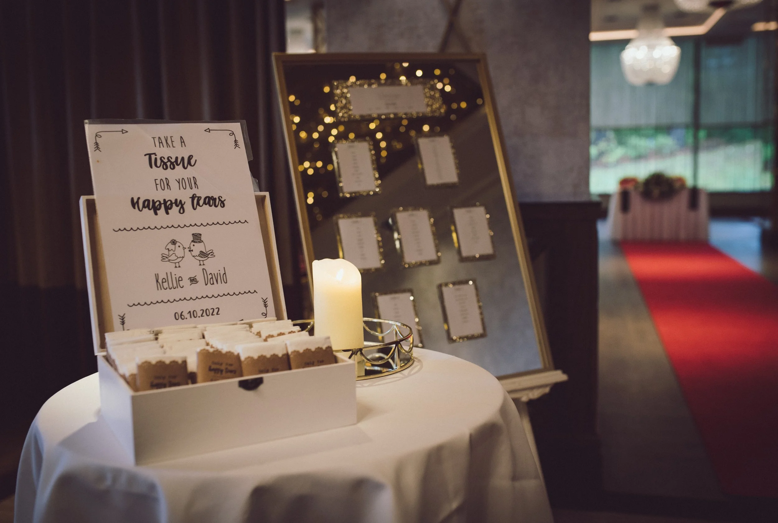 Wedding welcome table with personalised sign, treats and guest display