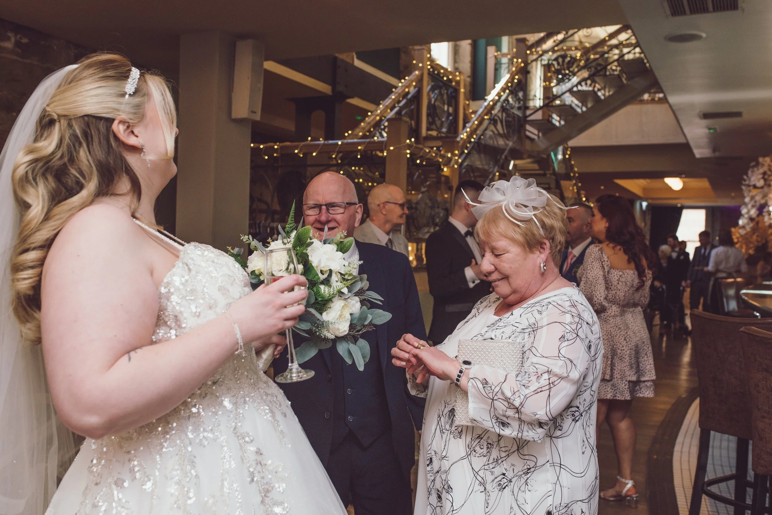 Bride chatting with wedding guests during a relaxed reception at Citation Glasgow