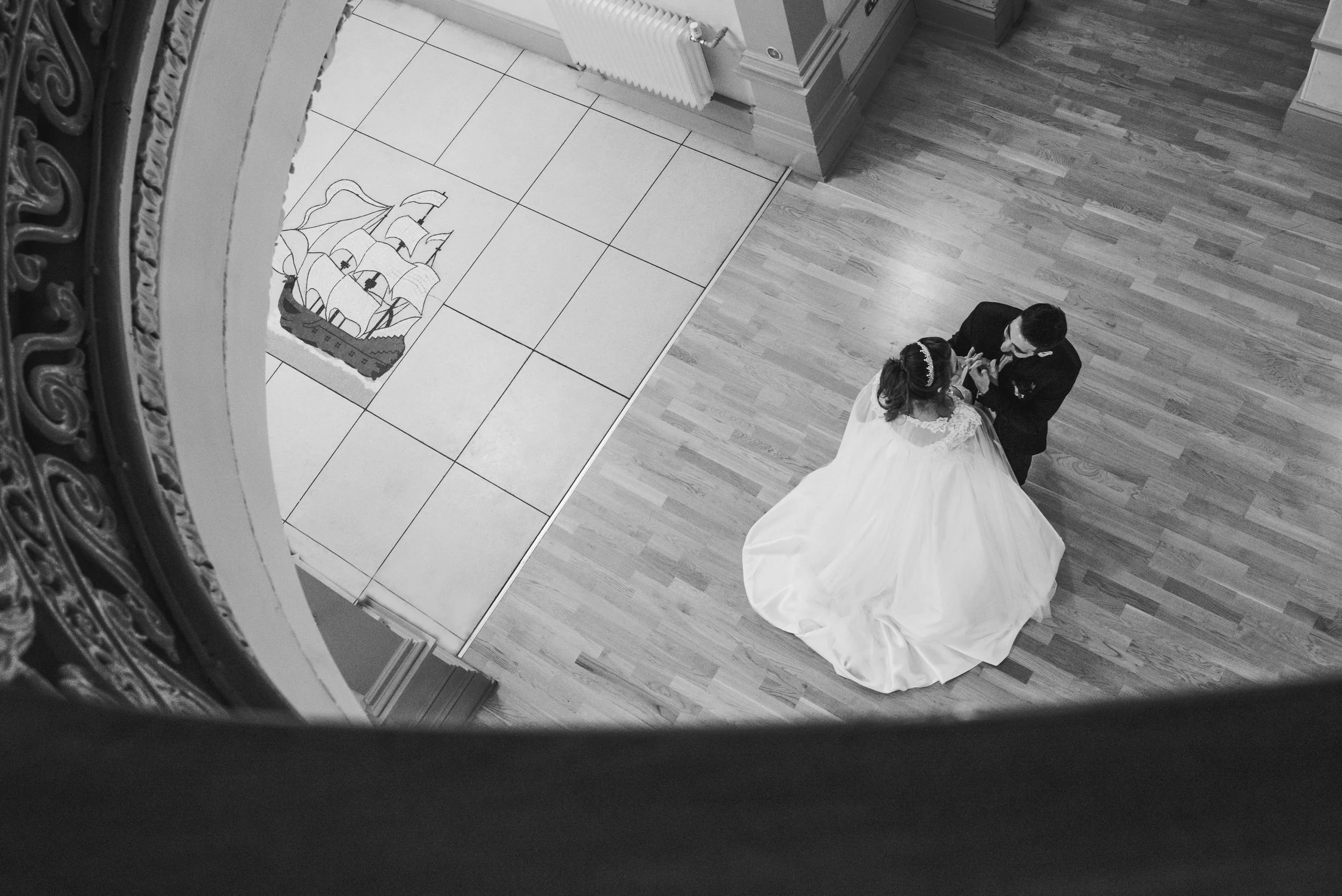 Bride and groom photographed from above on their wedding day