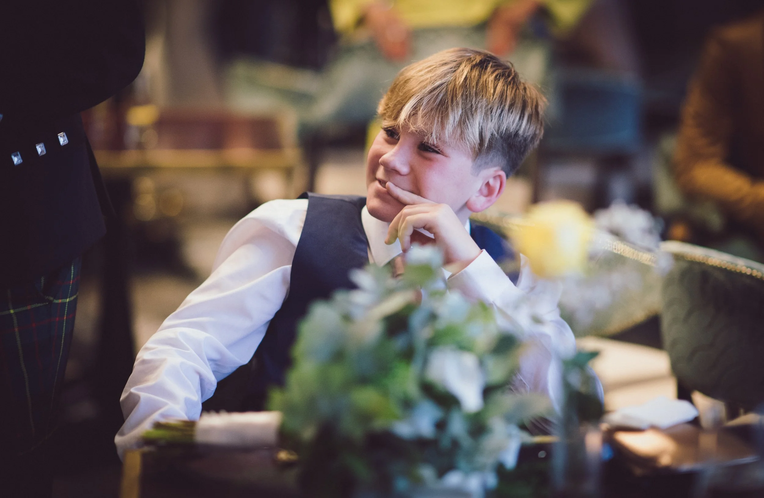 Young guest watching the wedding celebrations