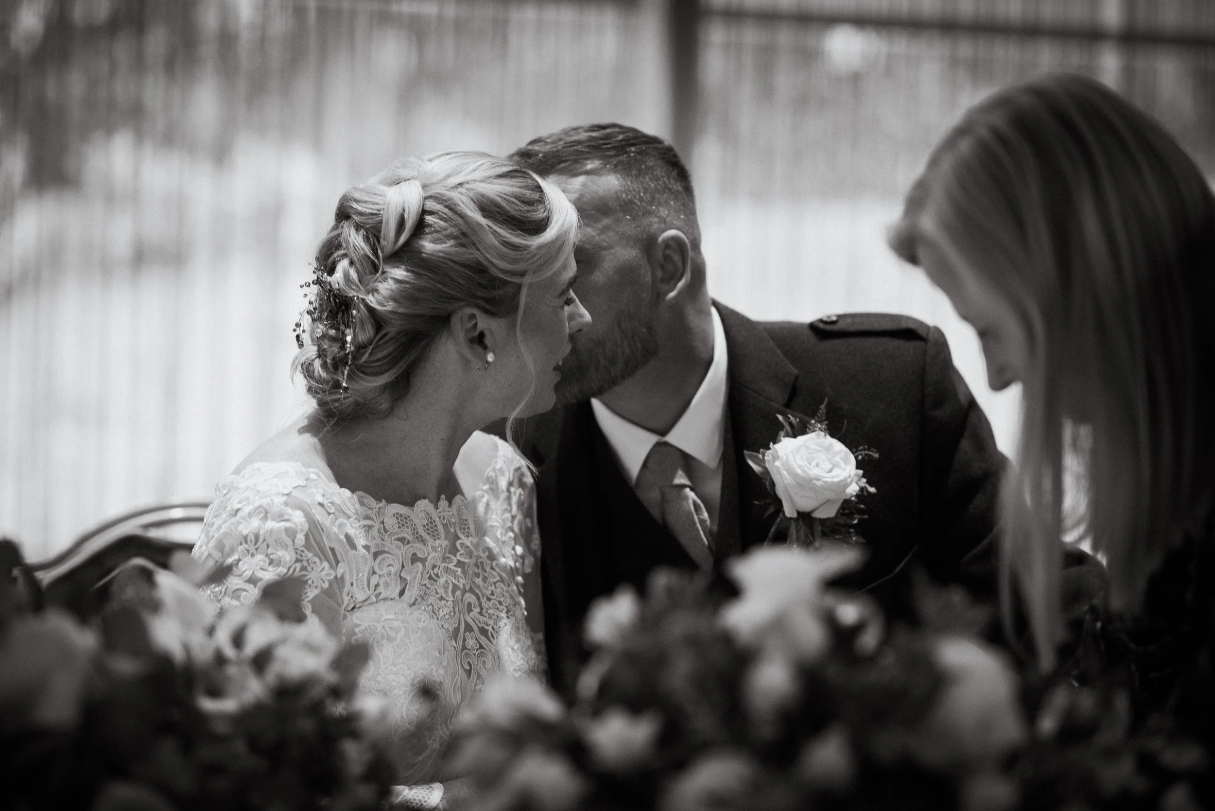 Bride and groom sharing a kiss on their wedding day