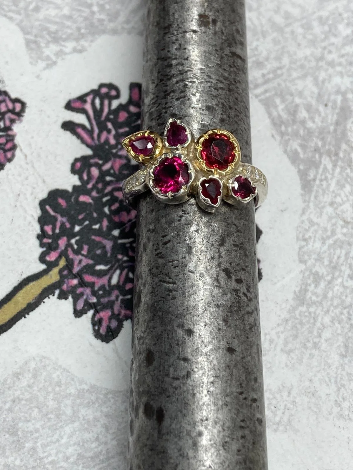 A flower-set cocktail ring heads north for Dazzle