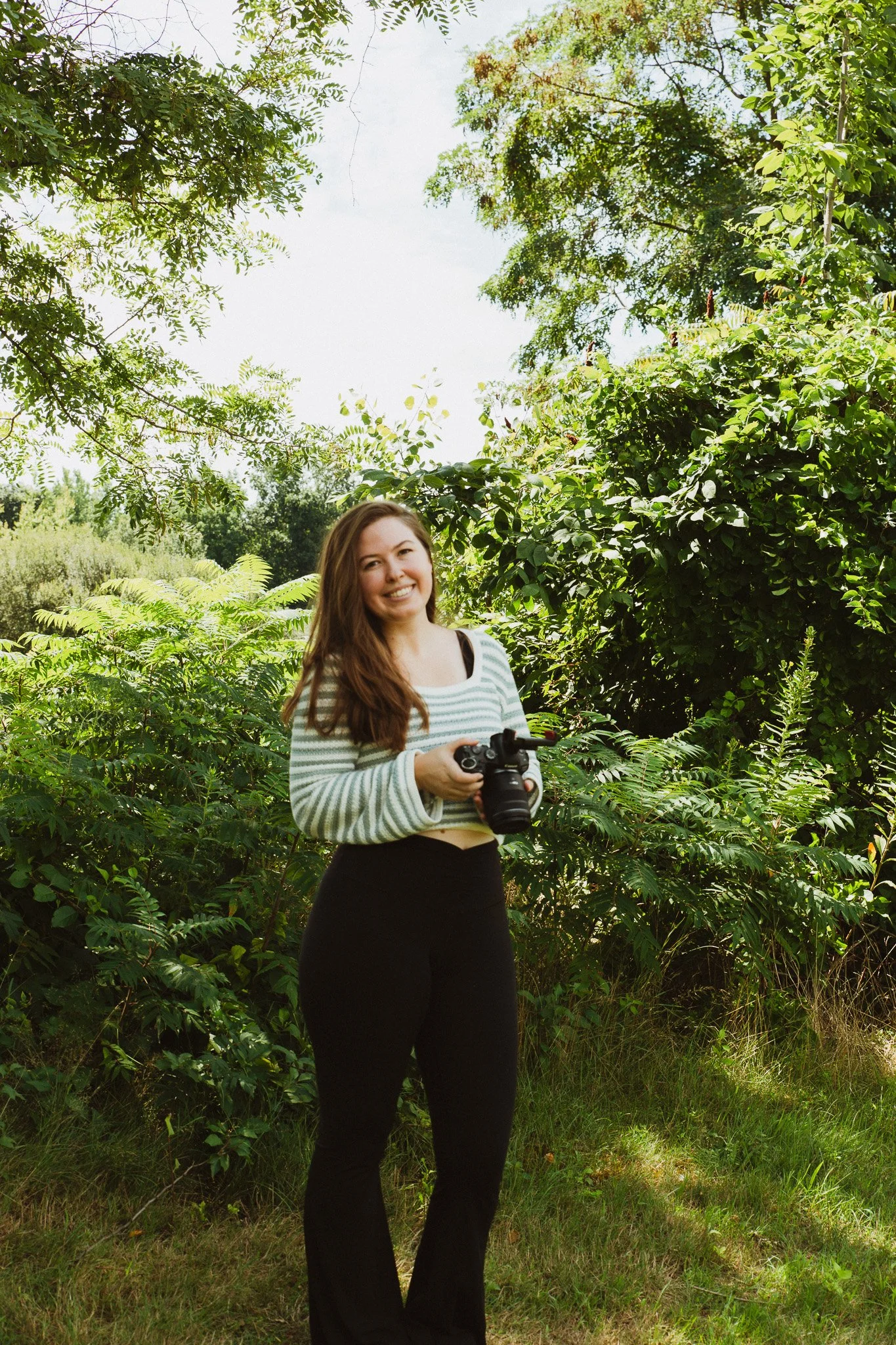 headshot of a new hampshire elopement photographer in nature