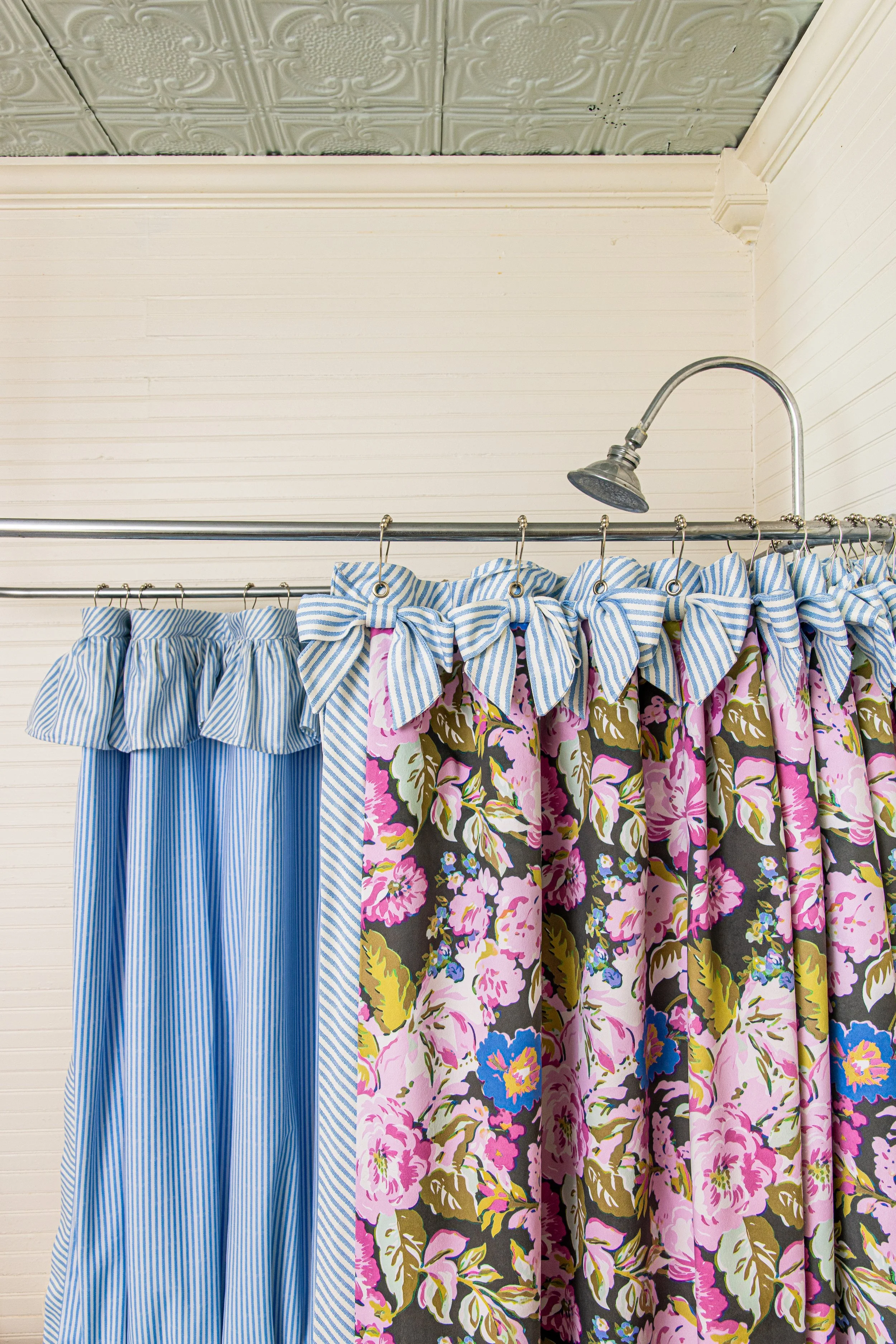 Intricate shower curtain complete with detachable liner, bow details and floral velvet outer layer.