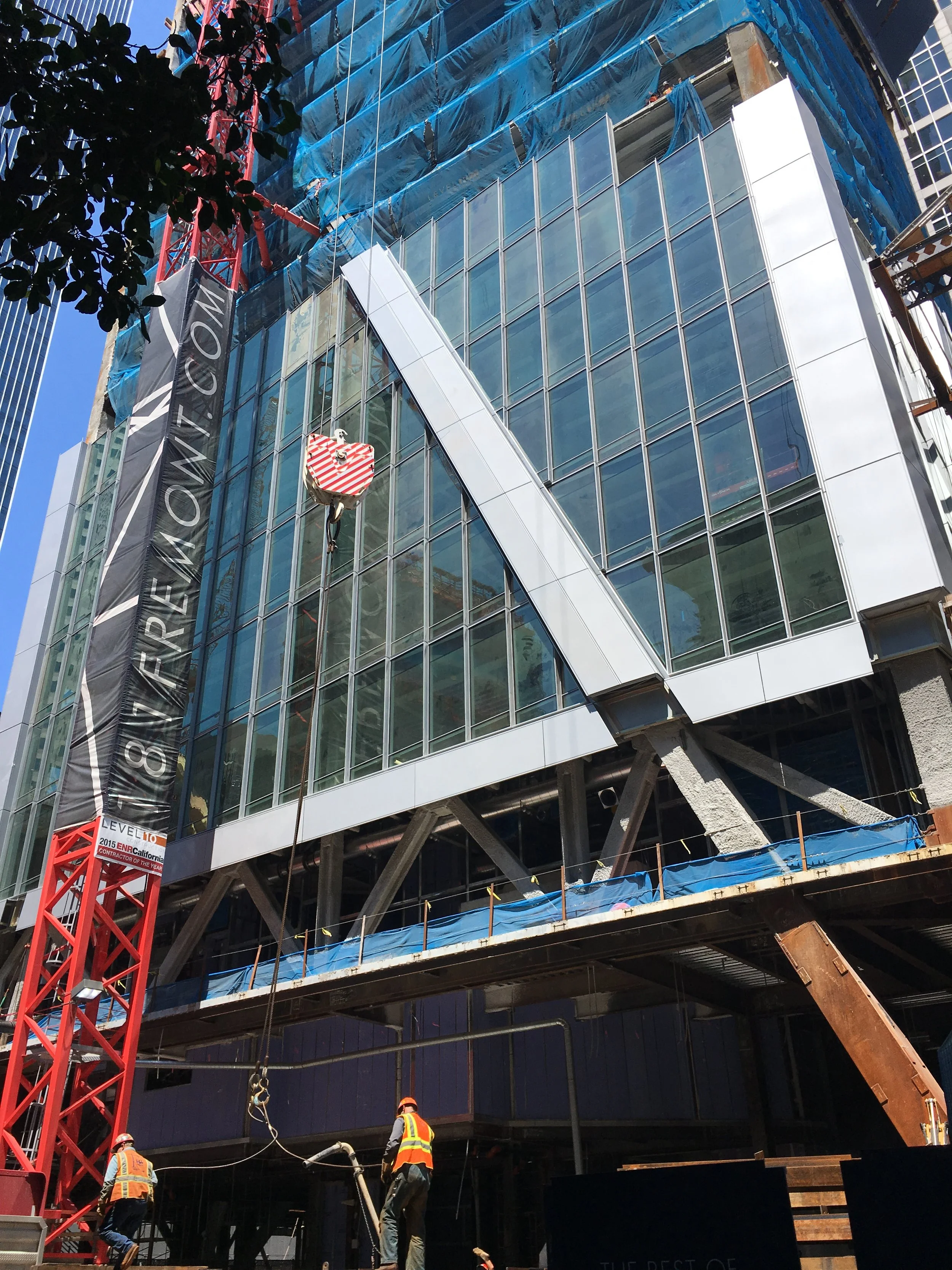 Photograph of in-progress podium-level construction.