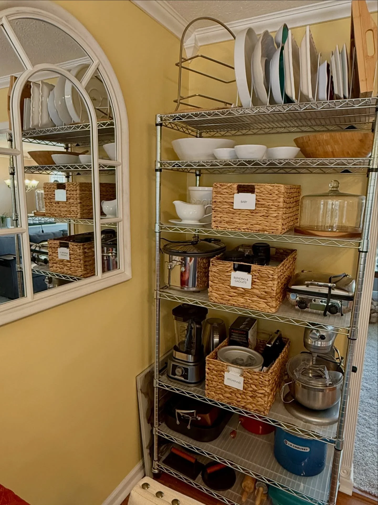 Not all organizing projects require a complete overhaul. 

Even unique ones like this metal shelving piece. 

It was a recent purchase for by client but needed a little styling and love.

We assessed the contents, relocated some items and even added 