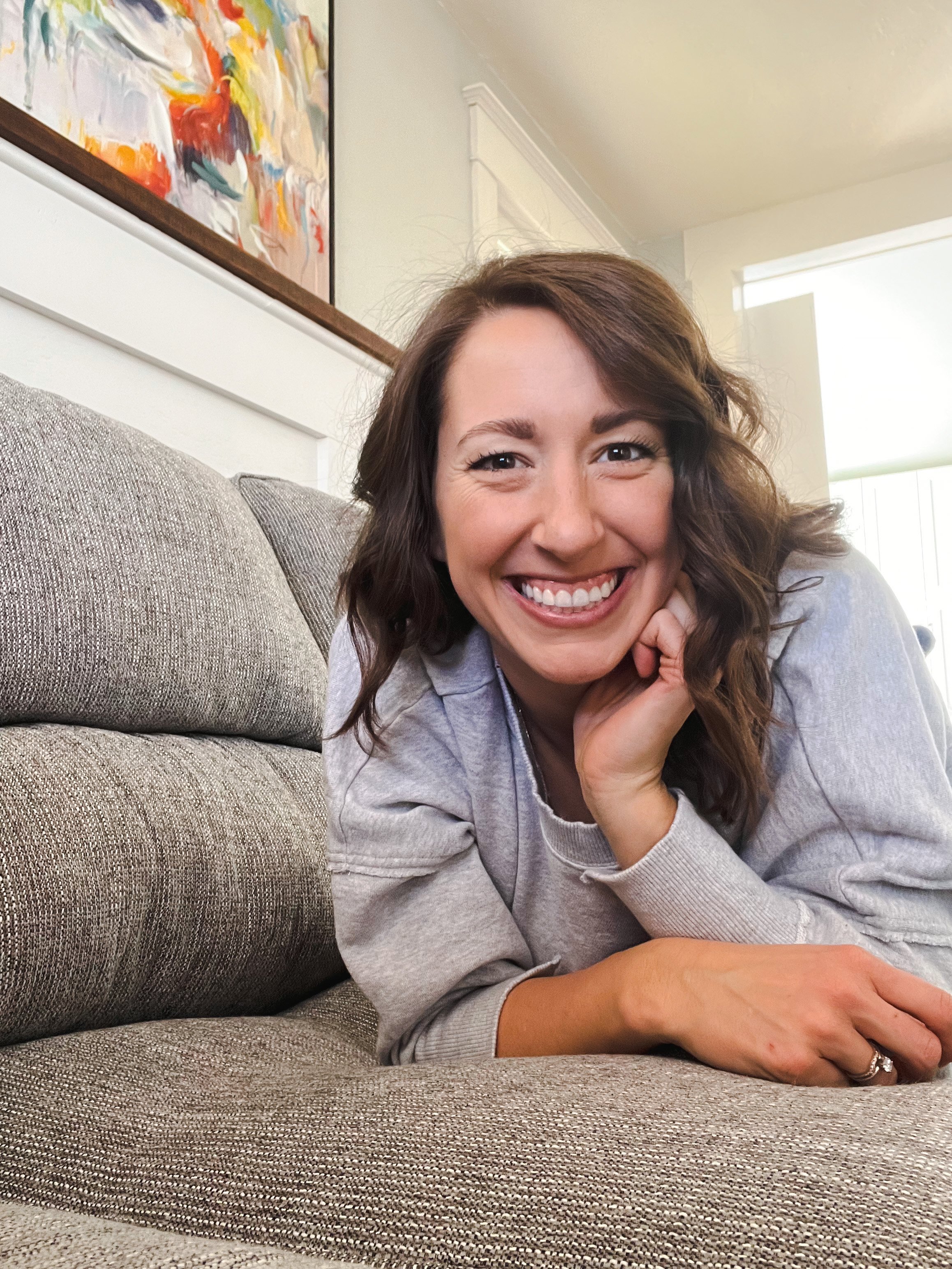 Alli B Organizing is smiling and ready to help you declutter and organize your home.  She has a welcoming personality that can help during the overwhelming process of getting organized.