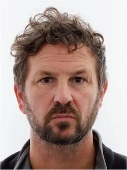 A headshot of FMG's Lawrence Weston