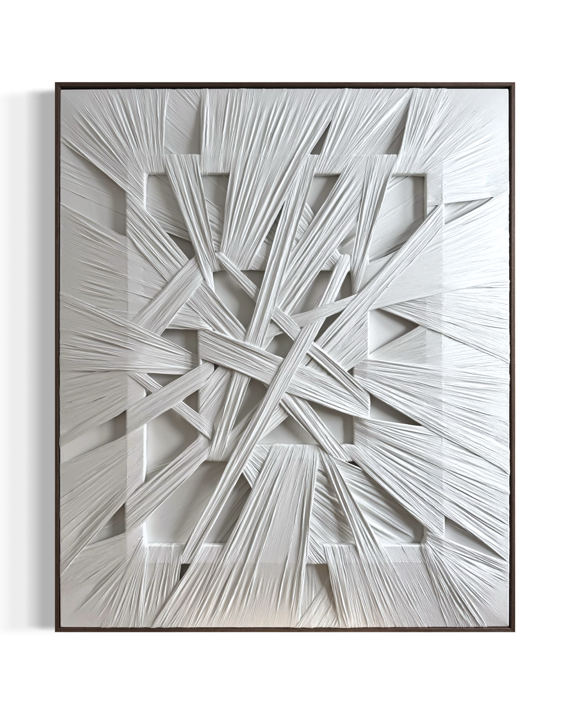 Abstract white textured artwork with layered, intersecting strips in a wooden frame.