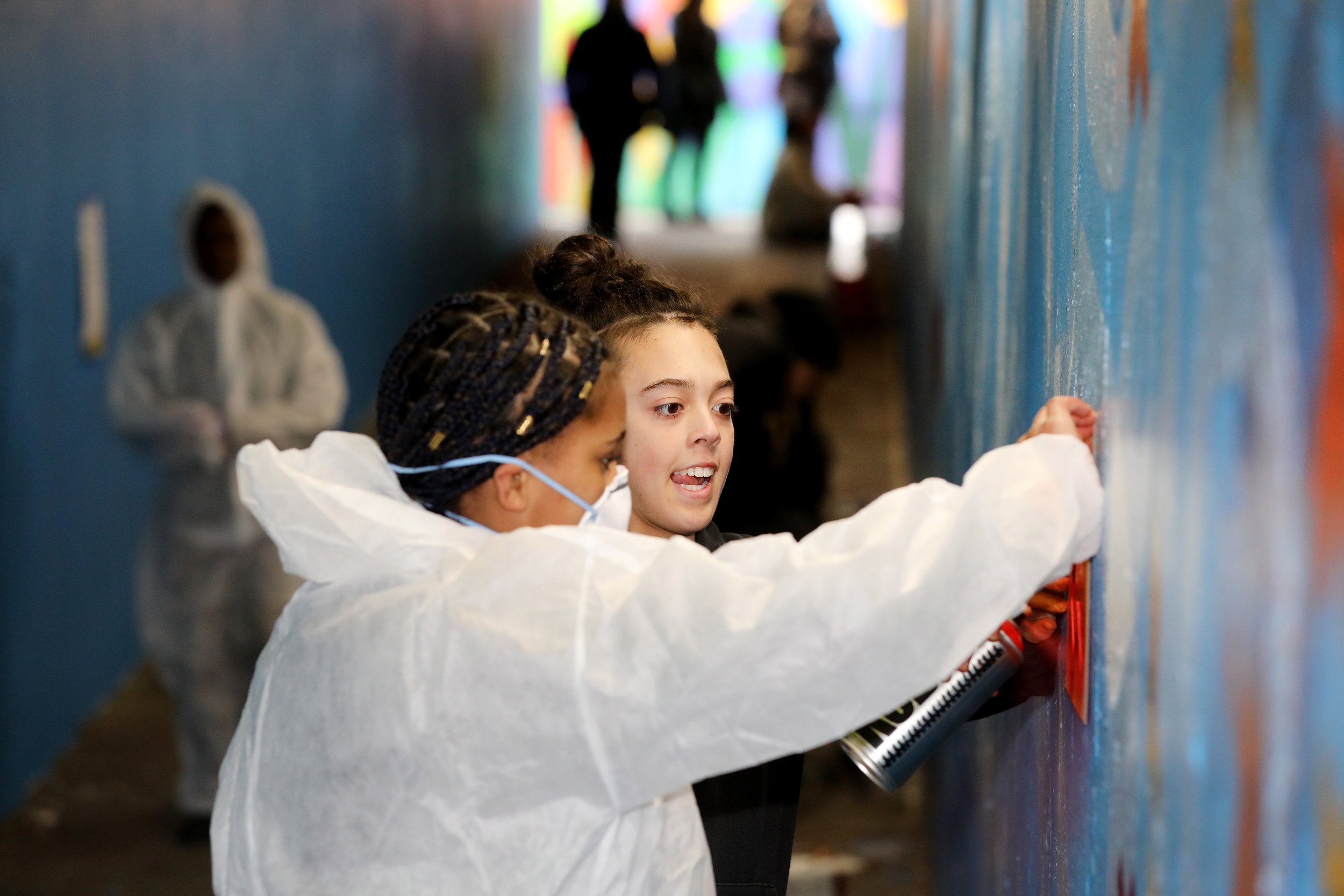 Baca Students enjoying trying spray paint