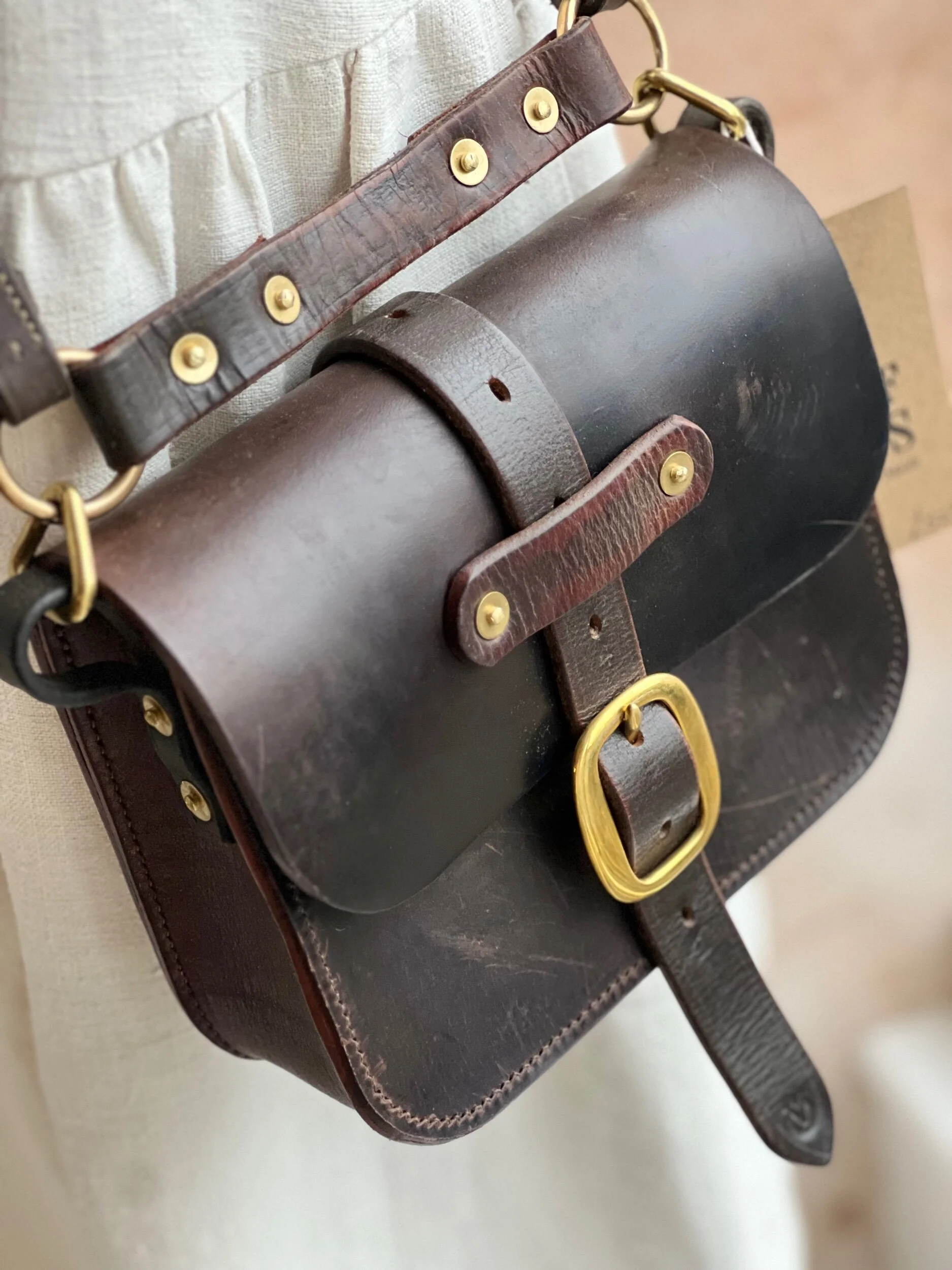 rag of colts handmade hand stitched repurposed saddle leather havana handbag with swage buckle