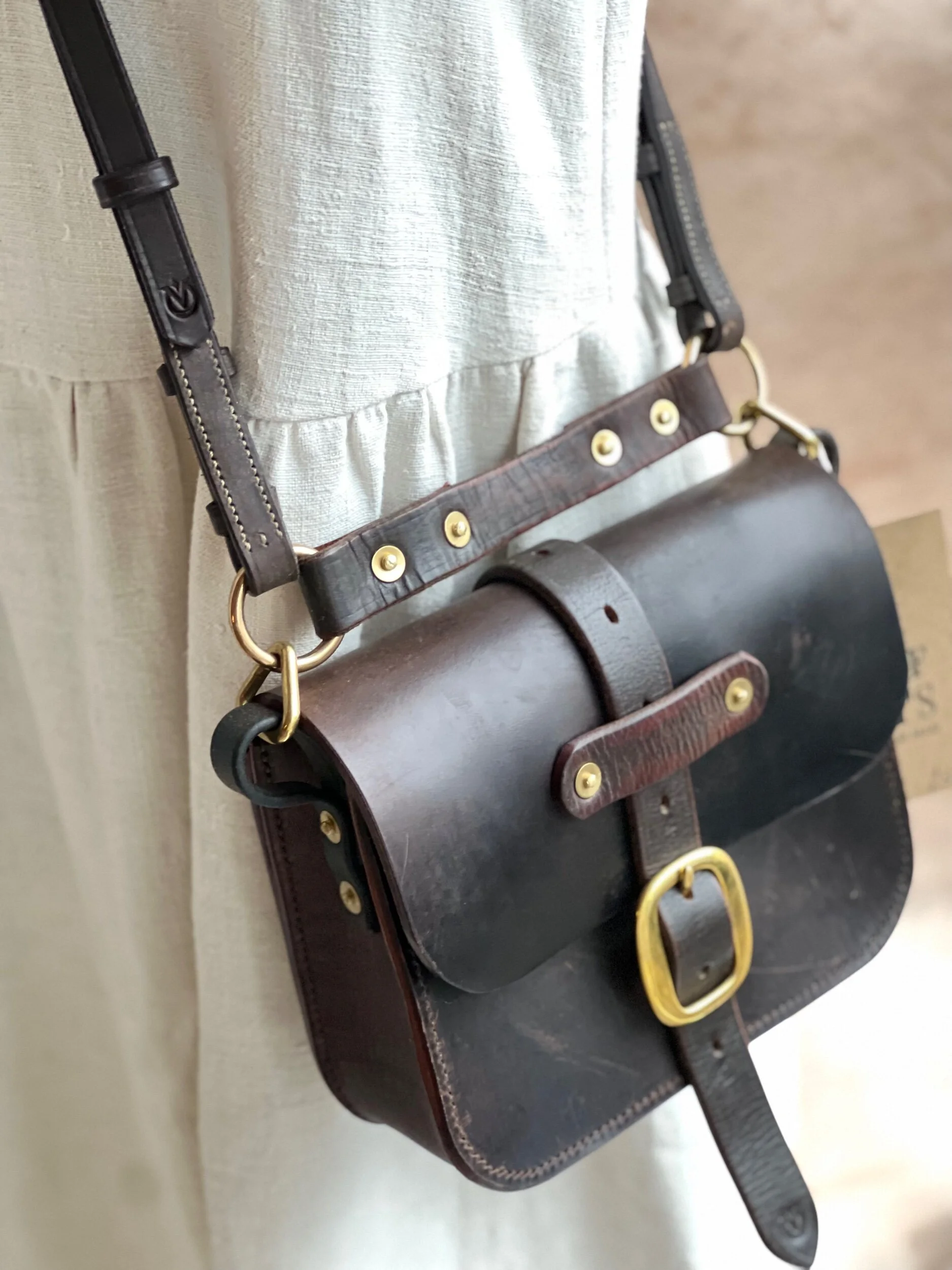 rag of colts handmade hand stitched repurposed saddle leather havana handbag with swage buckle