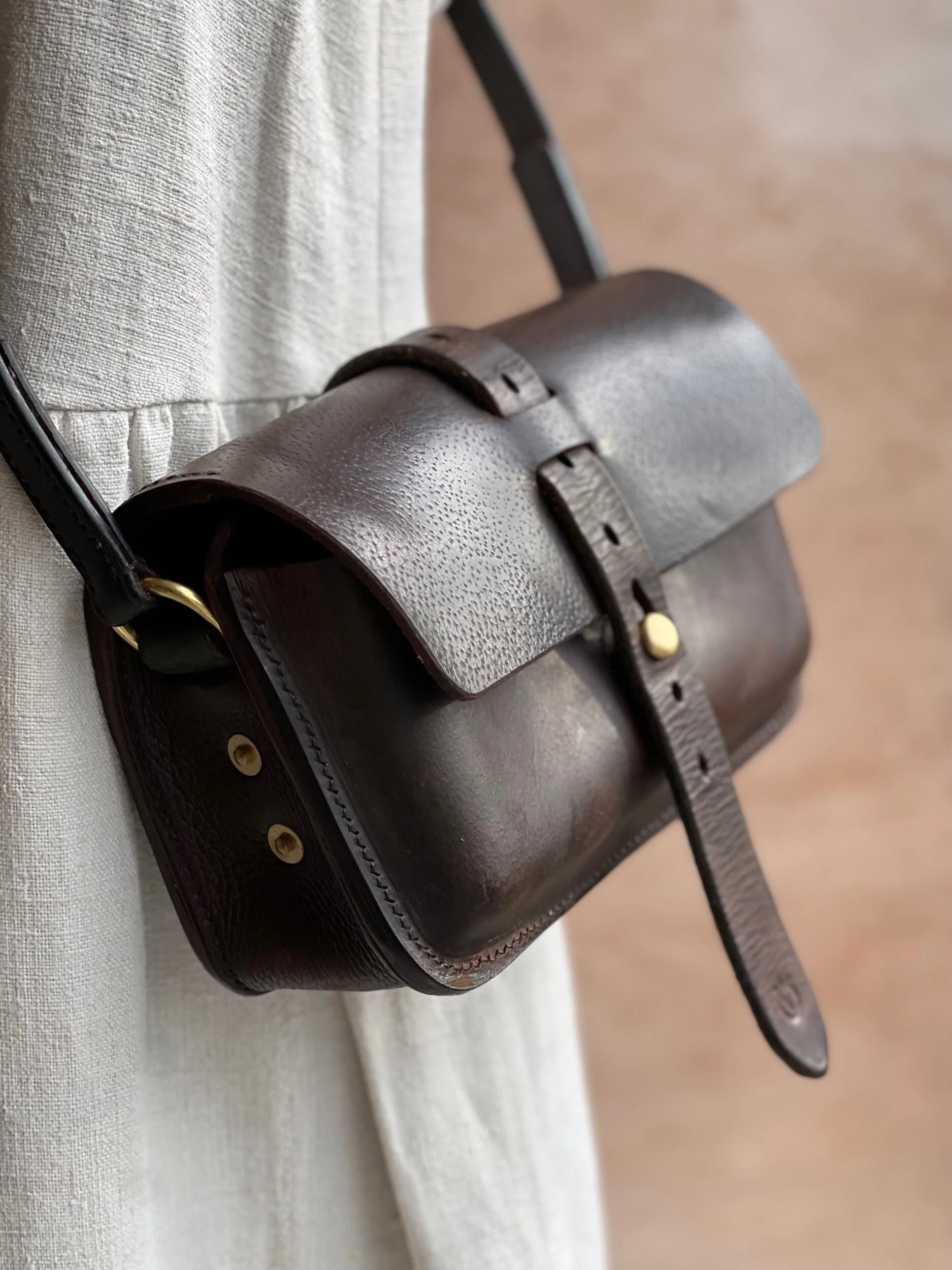 rag of colts handmade repurposed saddle leather hand bag hand stitched saddle stitched leather bag handbag