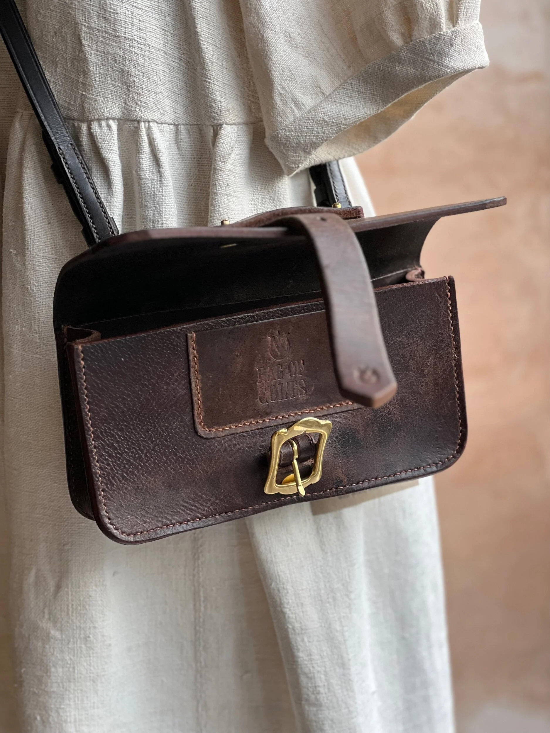 rag of colts handmade repurposed saddle leather hand bag hand stitched saddle stitched leather bag handbag