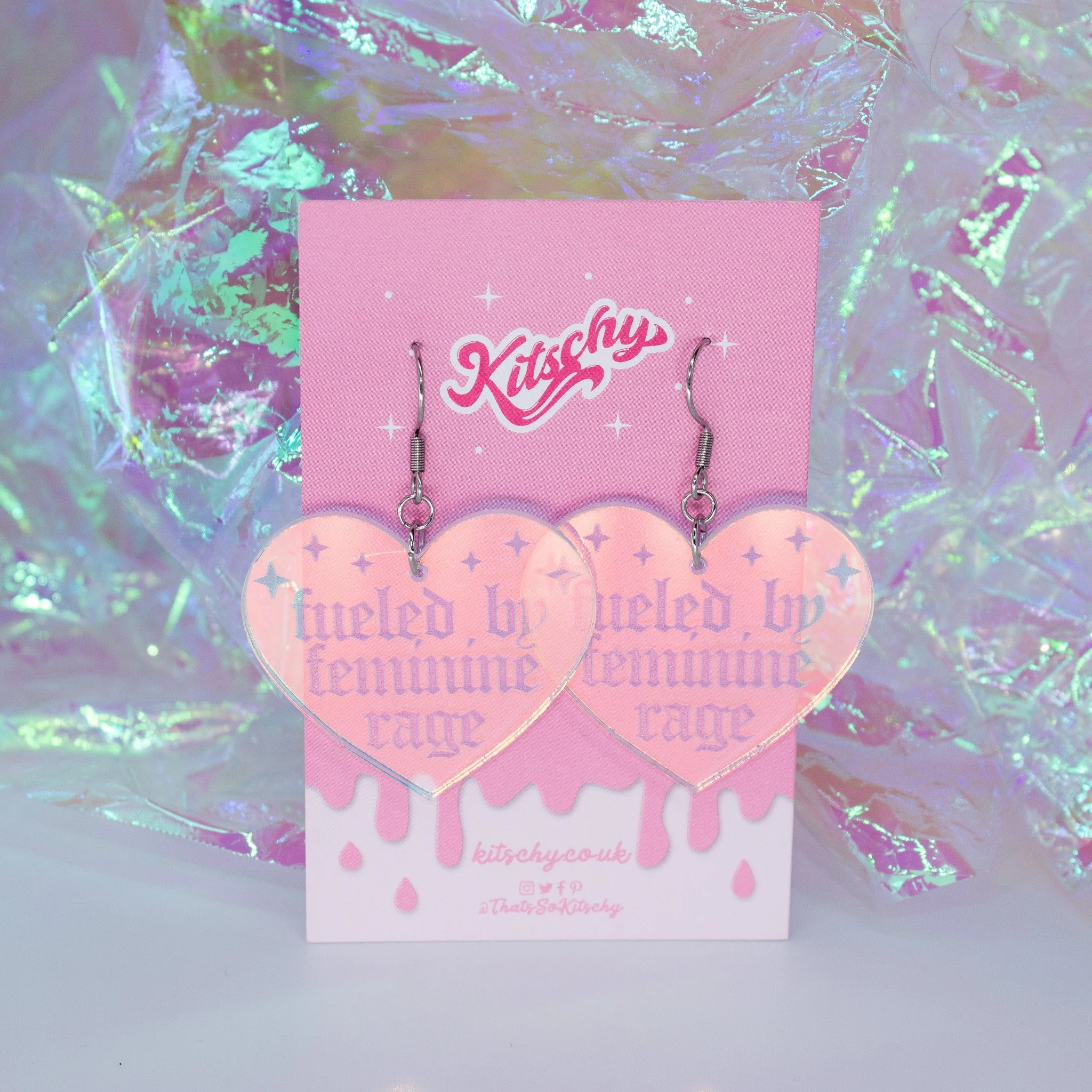 fuelled-by-feminine-rage-heart-iridescent-feminist-earrings-2.jpg
