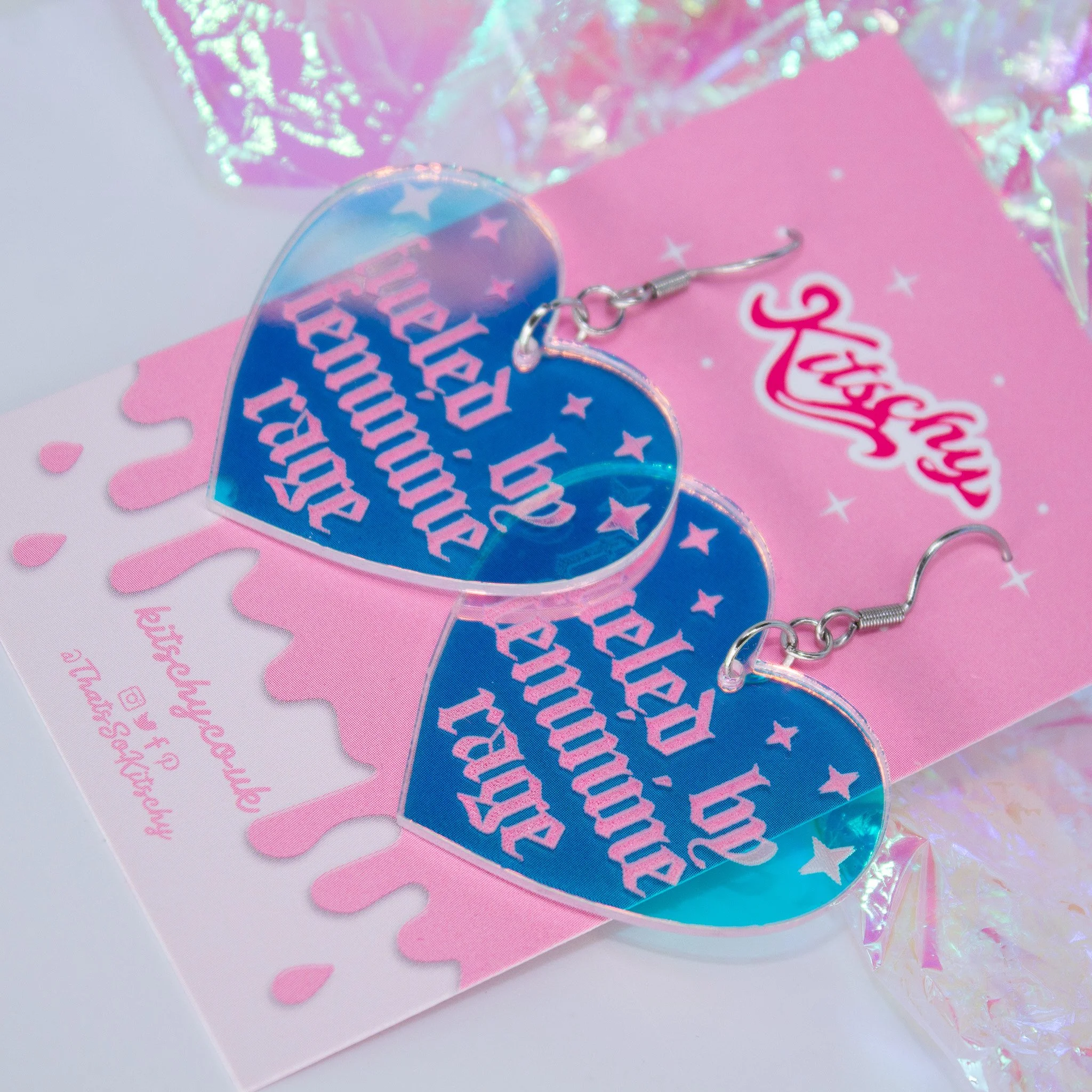 fuelled-by-feminine-rage-heart-iridescent-feminist-earrings-1.jpg