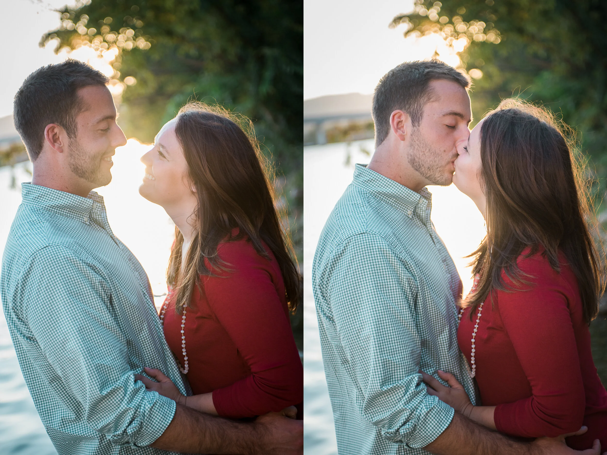 A couple standing close together outdoors during sunset, about to kiss, with a lake and trees in the background.