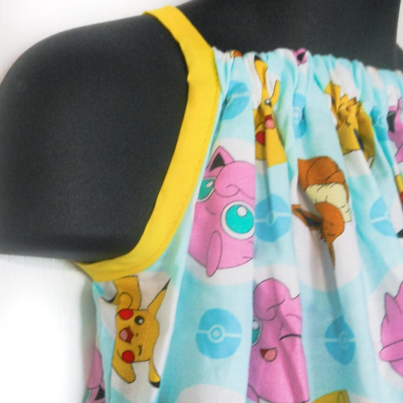 Pokemon Characters on Teal Sundress 6-12 Mo. Side