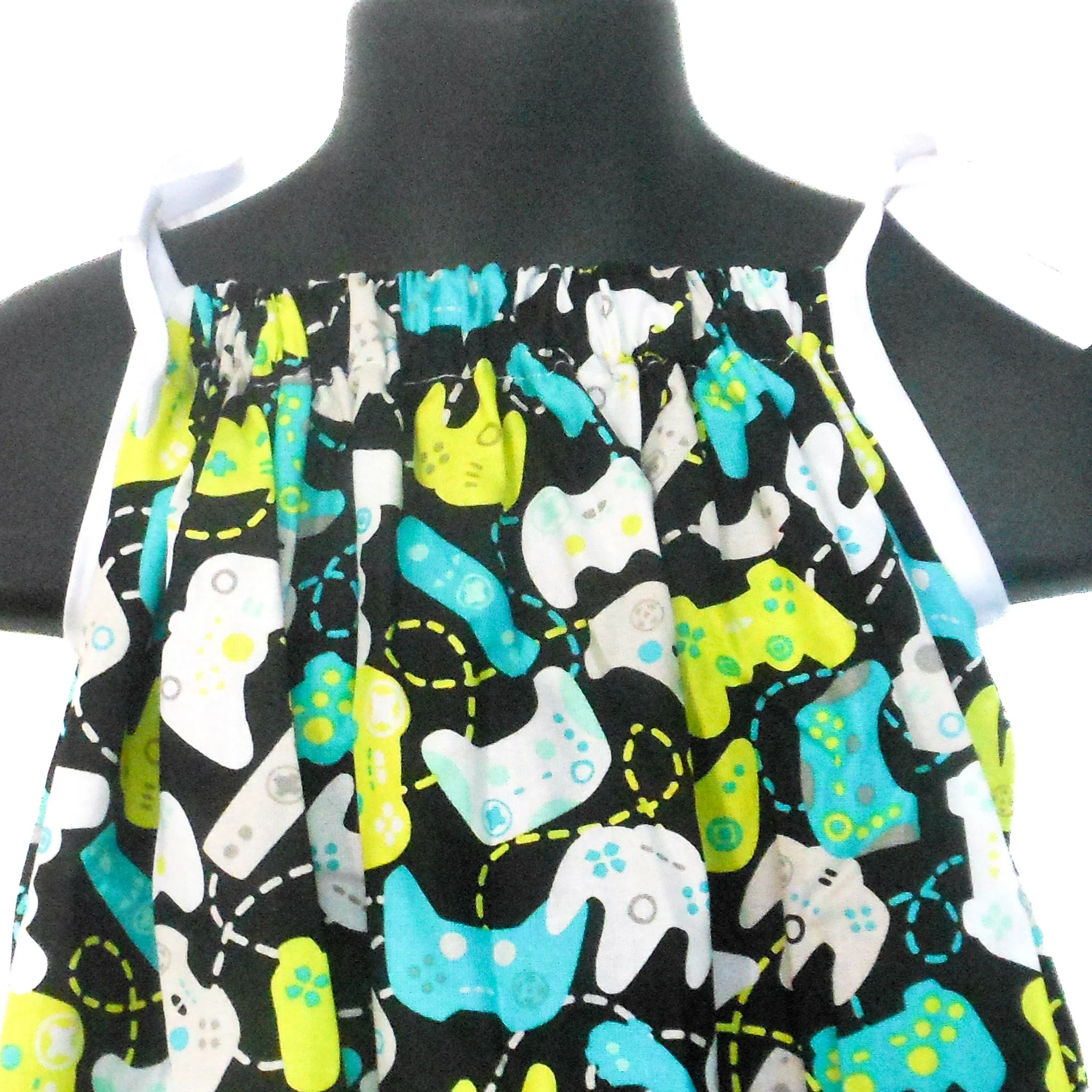 Kids Dress with video game controllers from Playstation, Nintendo, and XBox on a black background size 1-2T