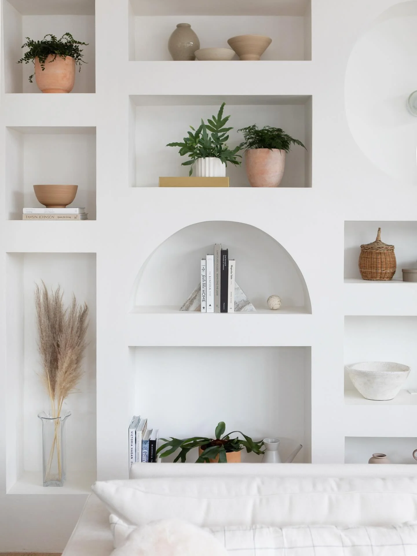 Layered in light and calm.

Built ins don&rsquo;t just store things, they tell a story. This curated moment blends texture, tone, and form to invite a sense of peace and presence. From earthy vessels to gathered botanicals, it&rsquo;s all about simpl