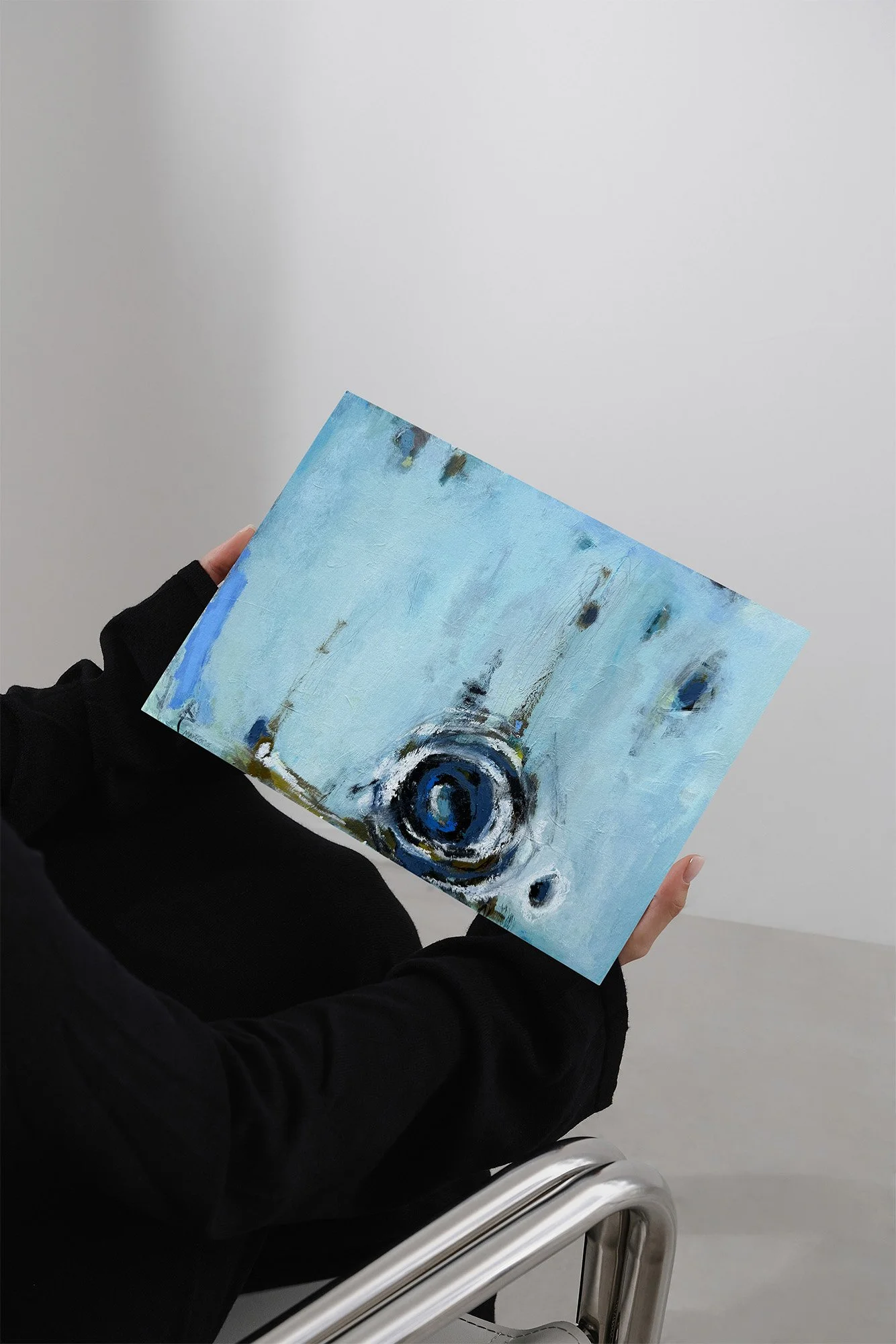Framed abstract painting in airy blue tones with a central circular shape, expressive brushwork, and a serene ocean-inspired mood.