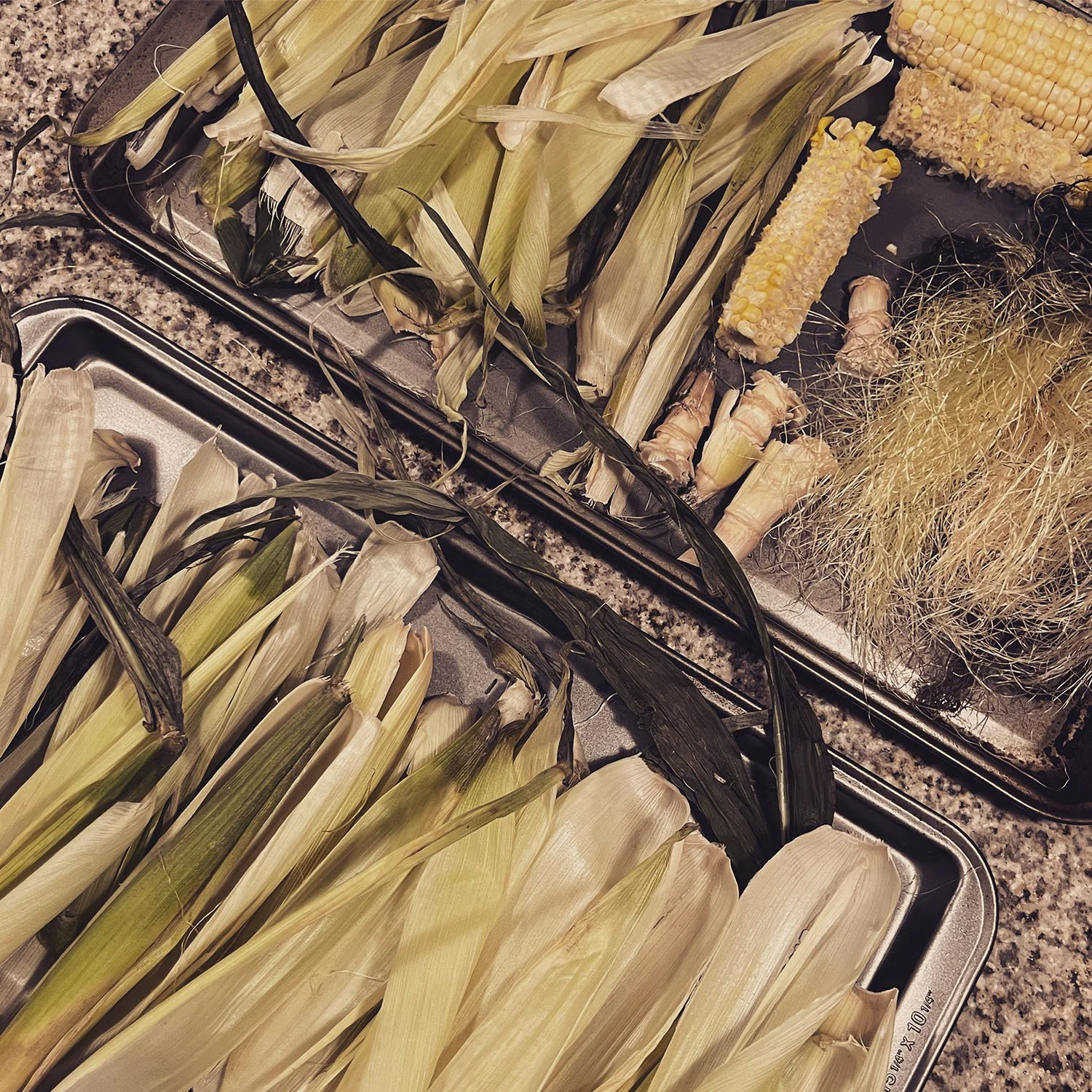 Trays of corn husks and parts