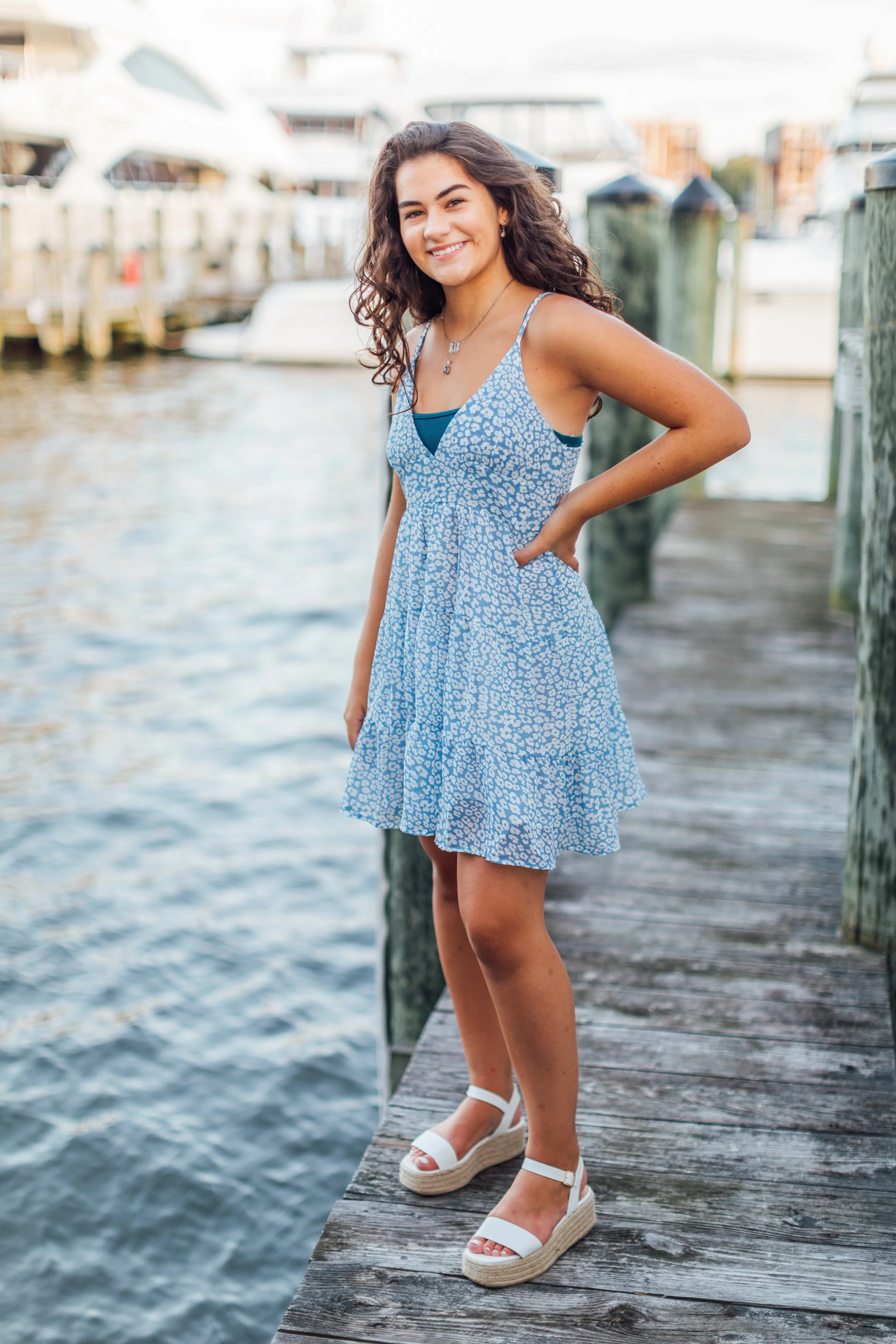 Heidi posing on the dock in Downtown Annapolis near the Annapolis Yacht Club for her senior photos.