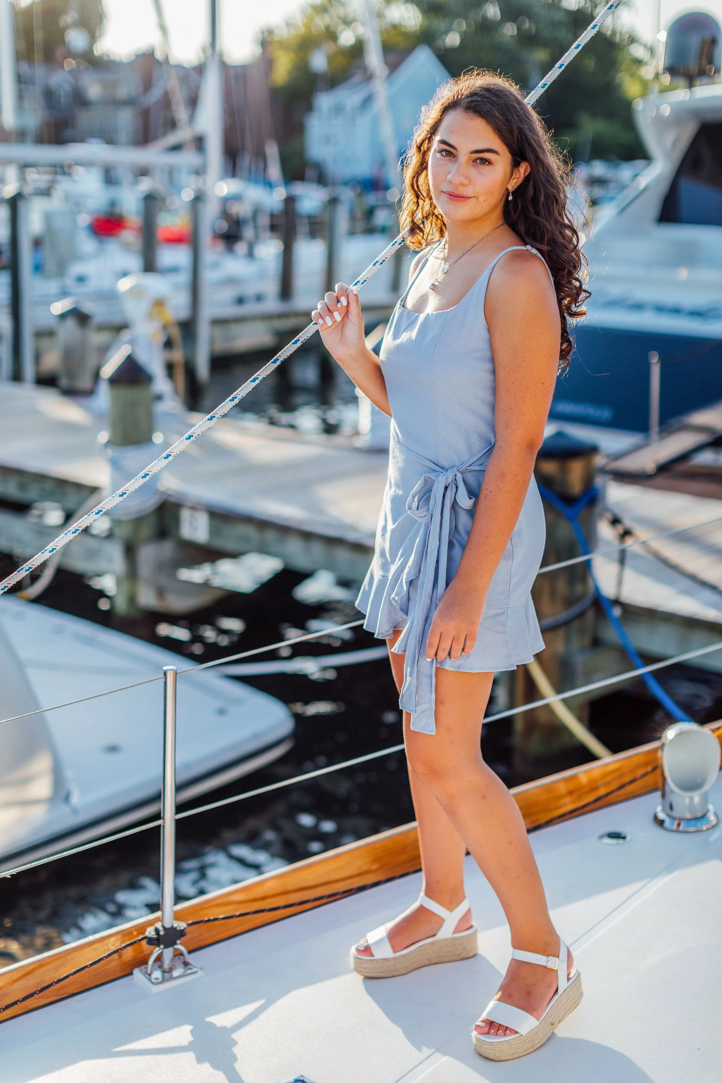 Sailing senior! Senior photos on a sailboat in Annapolis Maryland.