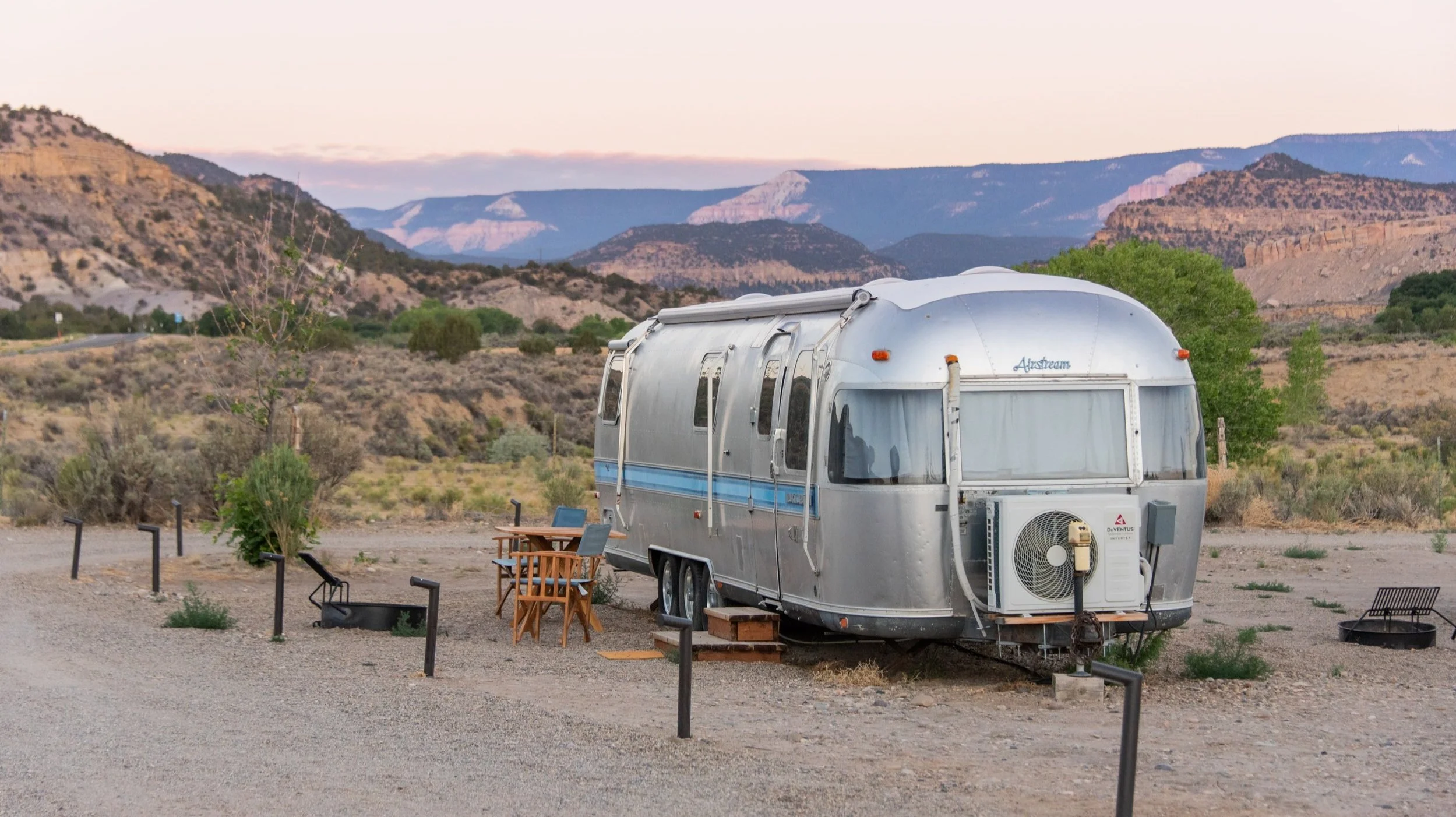 Exterior view of Vontage Airstream with expansive vistas in the distance