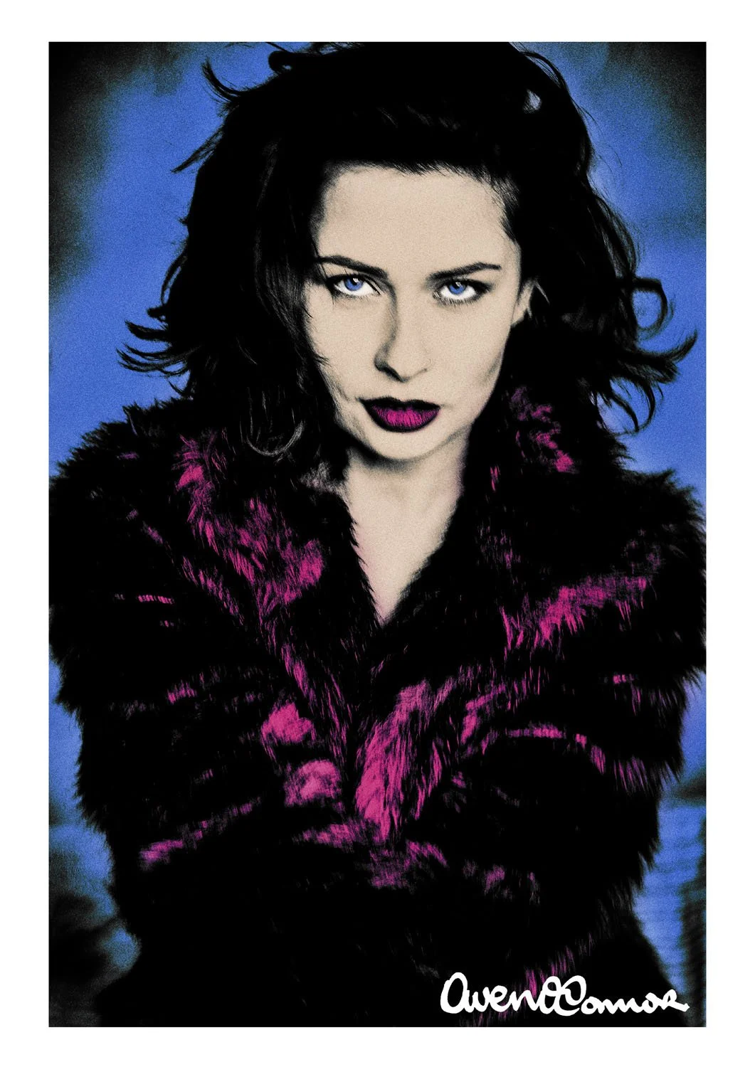 A woman with blue eyes and dark wavy hair wearing a pink and black fur coat, looking directly at the camera. There is an autograph at the bottom right corner.