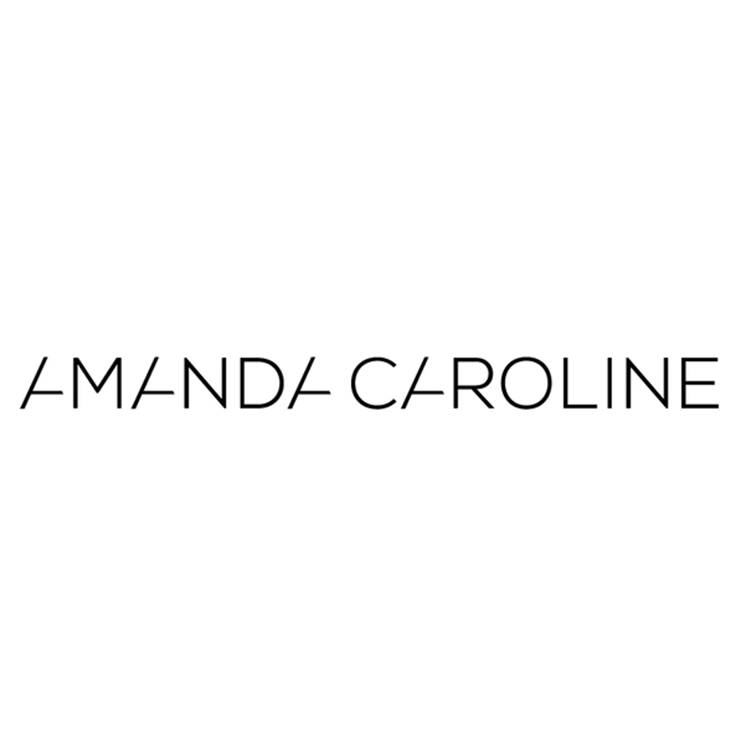 The name 'Amanda Caroline' written in black font on a white background, with a stylized slash between the first and last names.